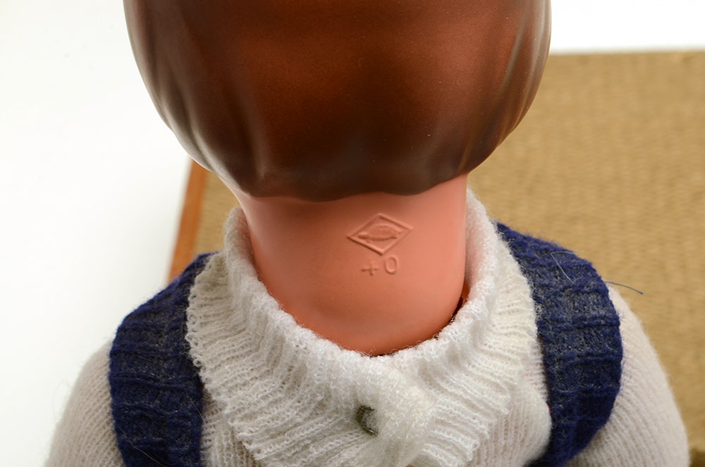 Group of Nine Collectable Dolls with Two Doll Cases