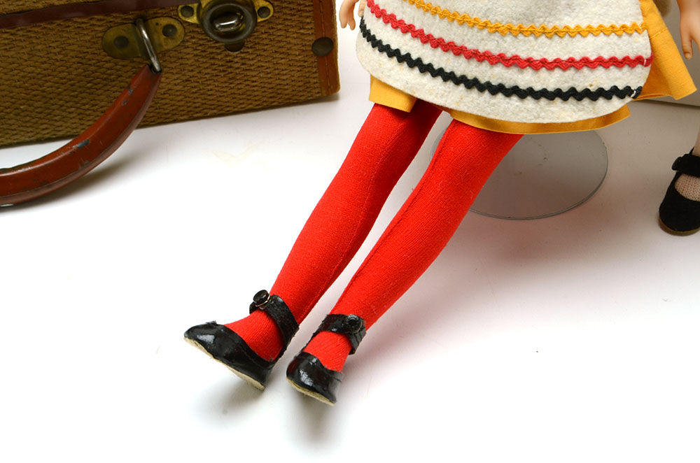 Group of Nine Collectable Dolls with Two Doll Cases