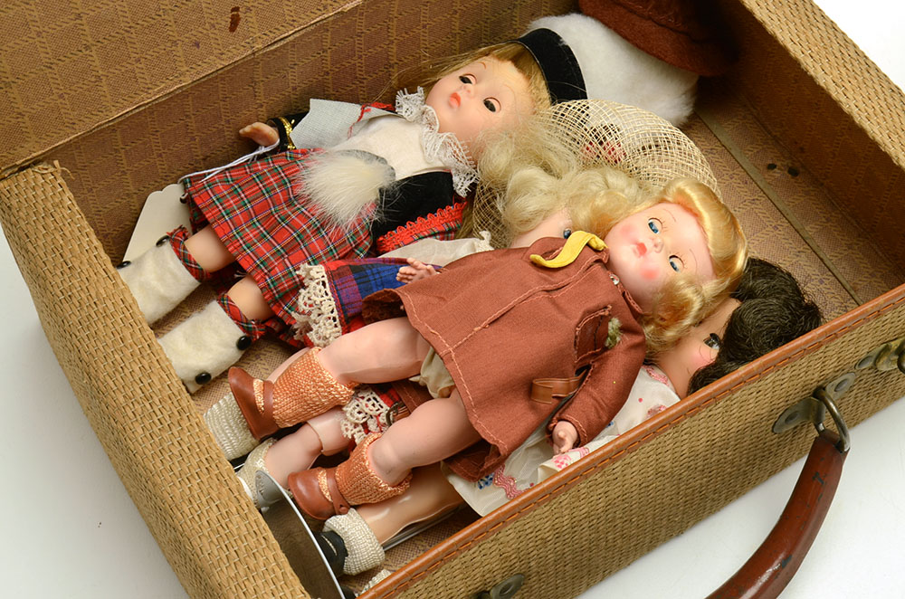 Group of Nine Collectable Dolls with Two Doll Cases