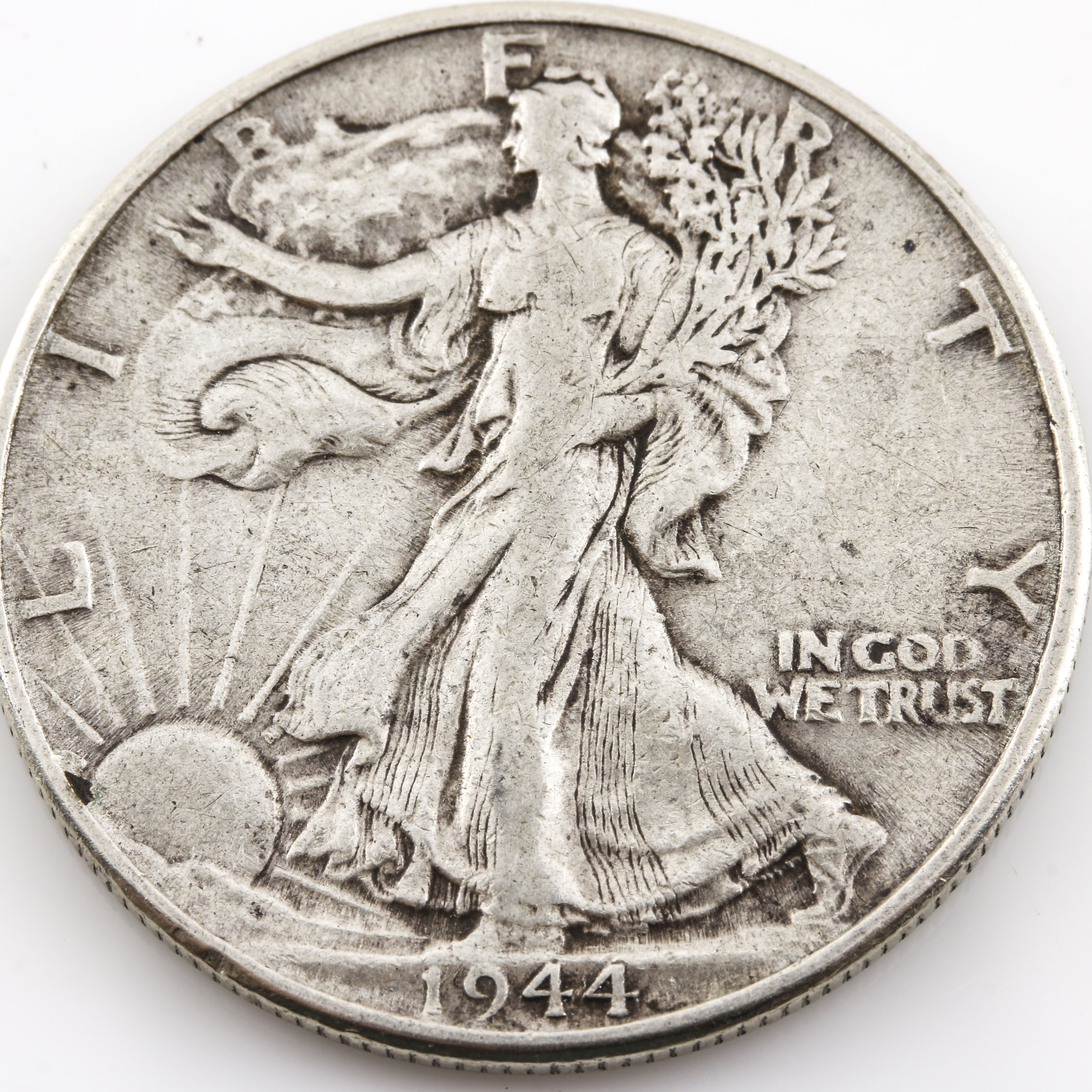 Group of Nine Walking Liberty Silver Half Dollars with Years Ranging from 1937 to 1946