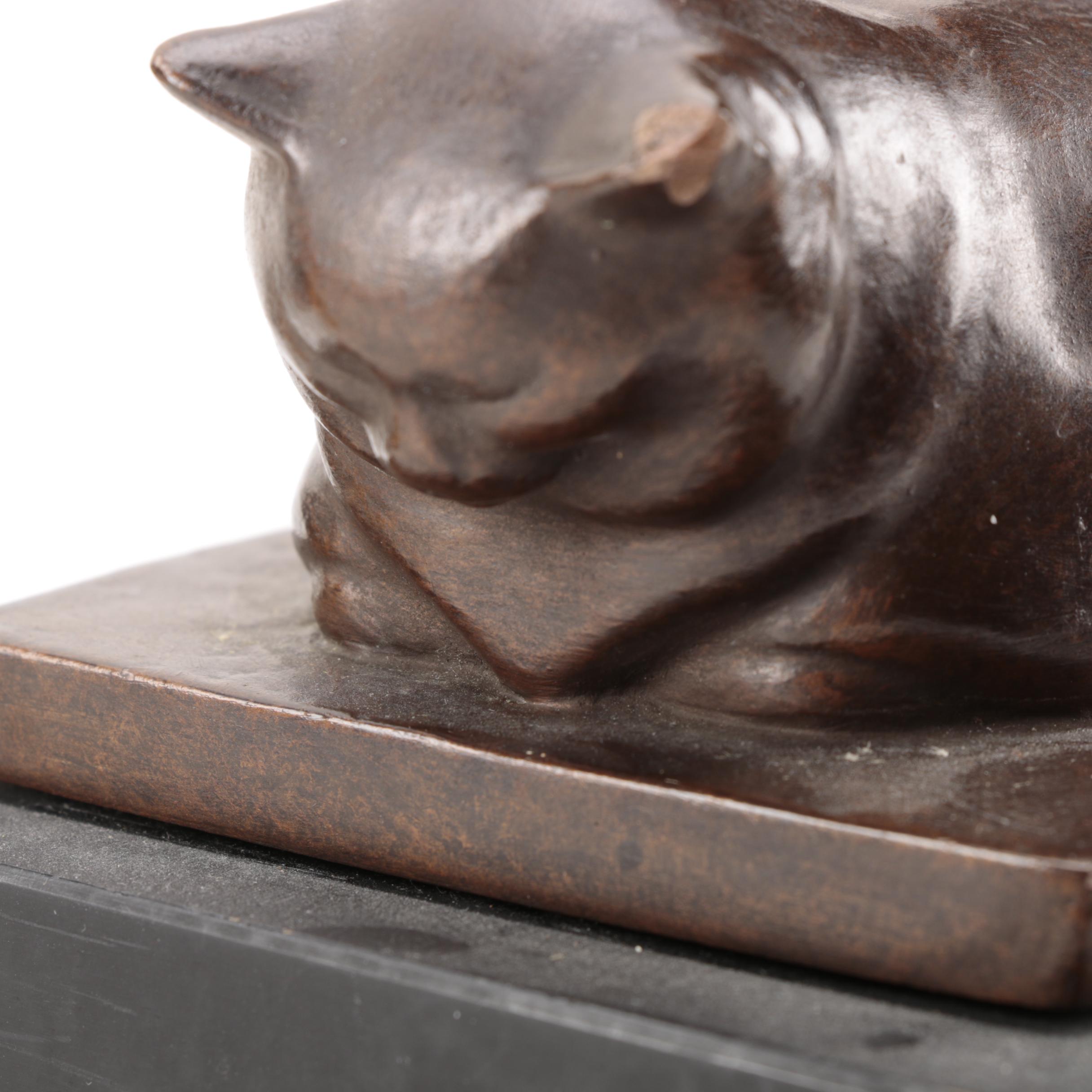 Grouping of Sleepy Cat Figurines