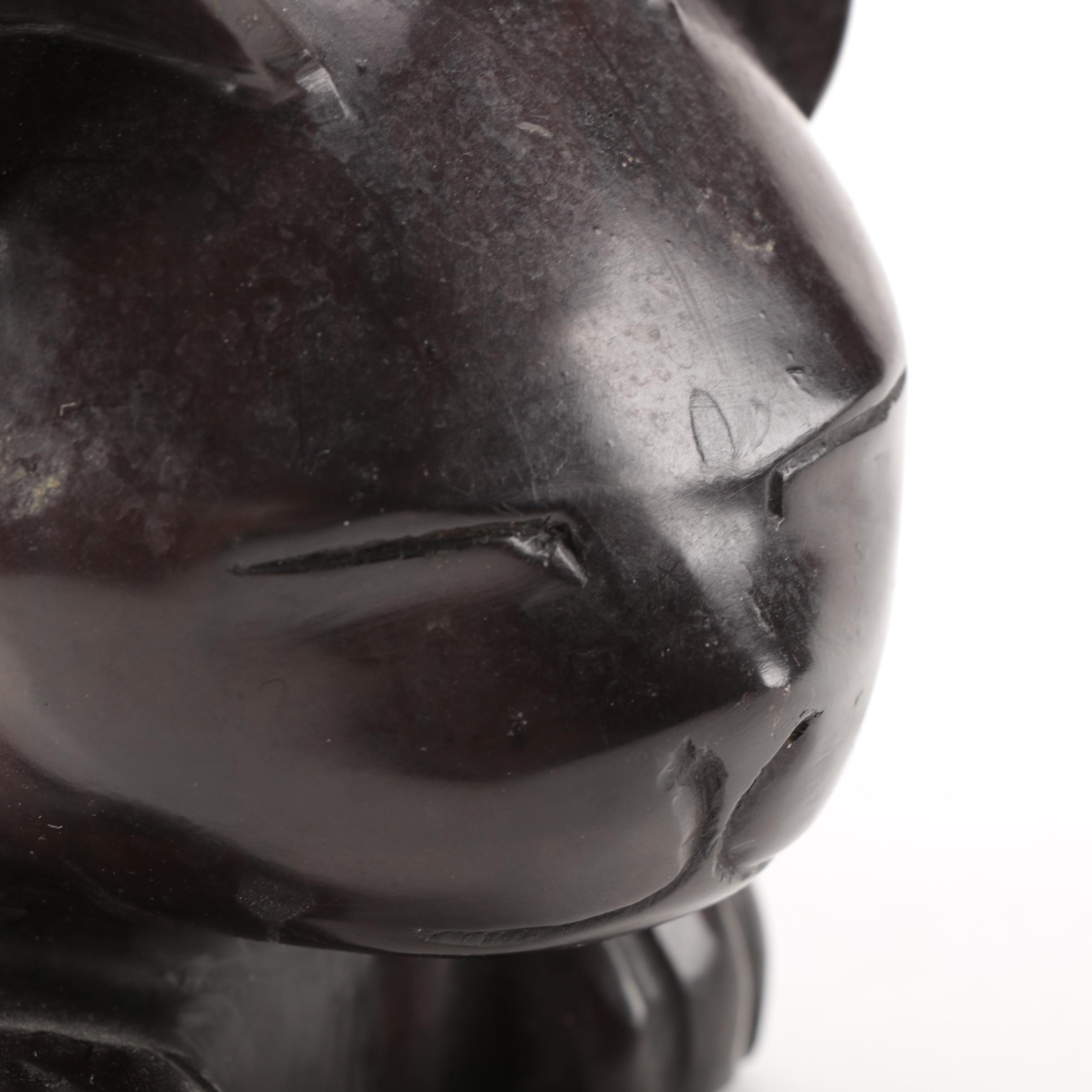 Grouping of Sleepy Cat Figurines