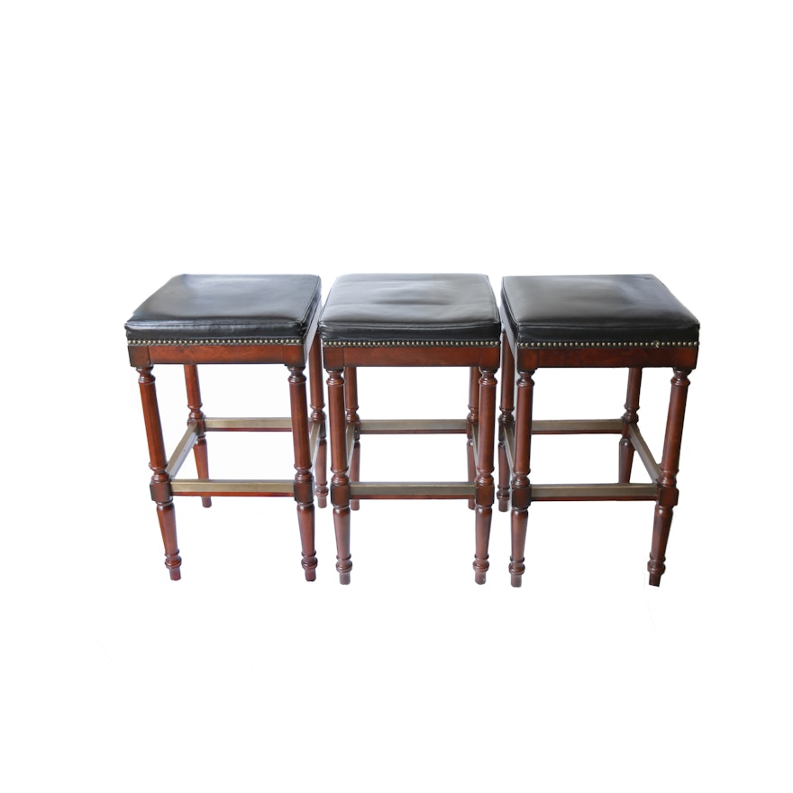 Three Wooden and Leather Bar Stools