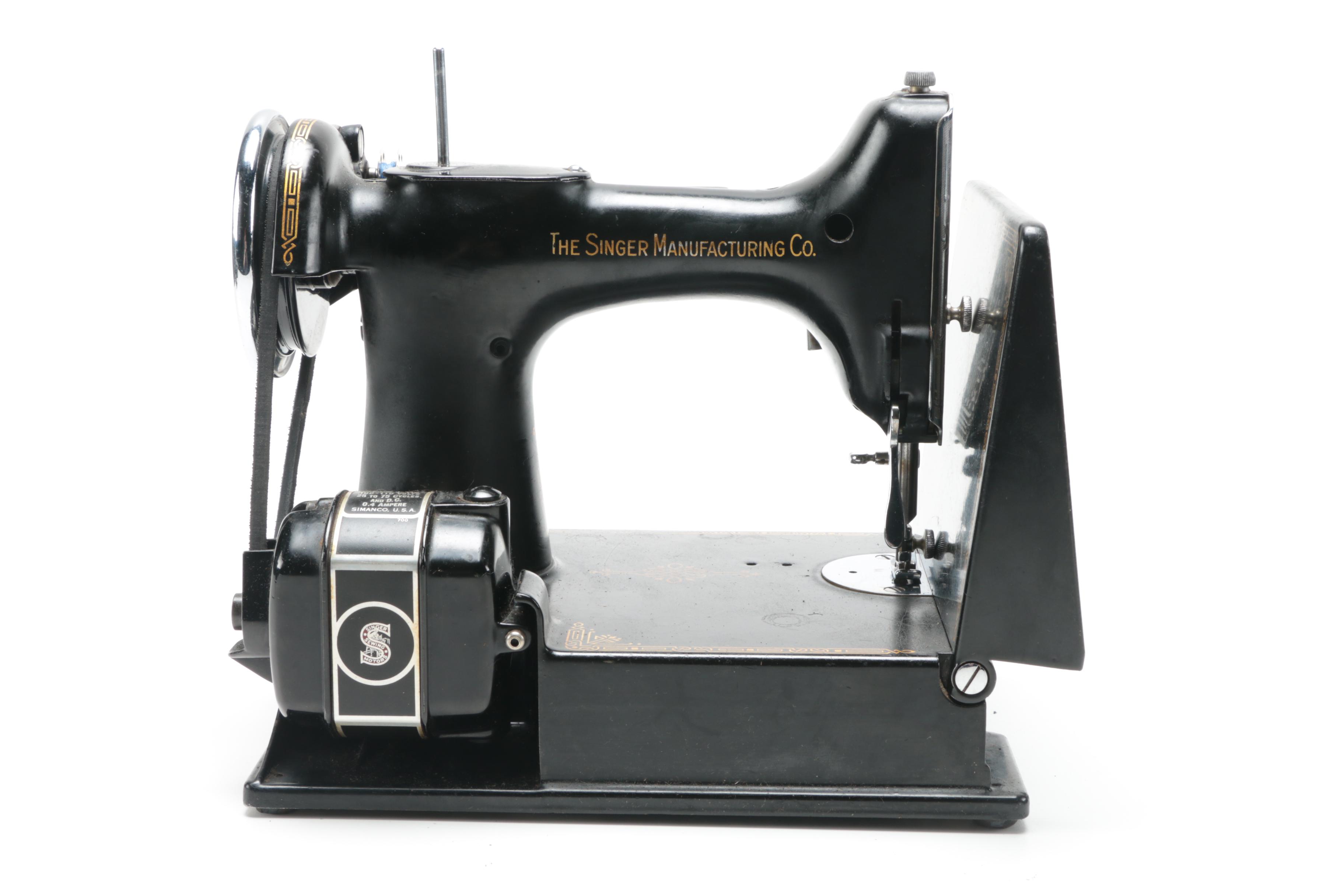 Singer Sewing Machine with Case and Accessories