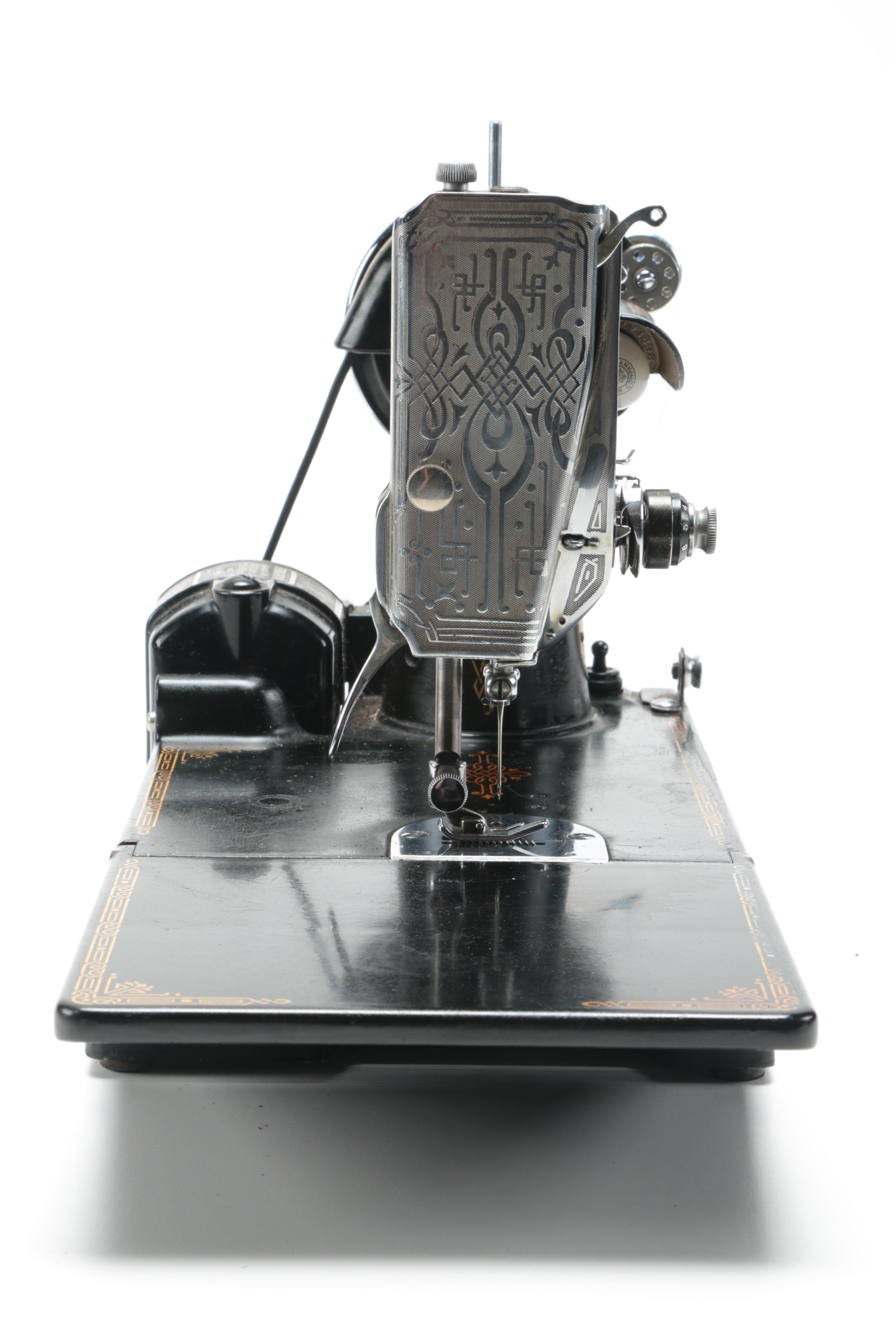 Singer Sewing Machine with Case and Accessories