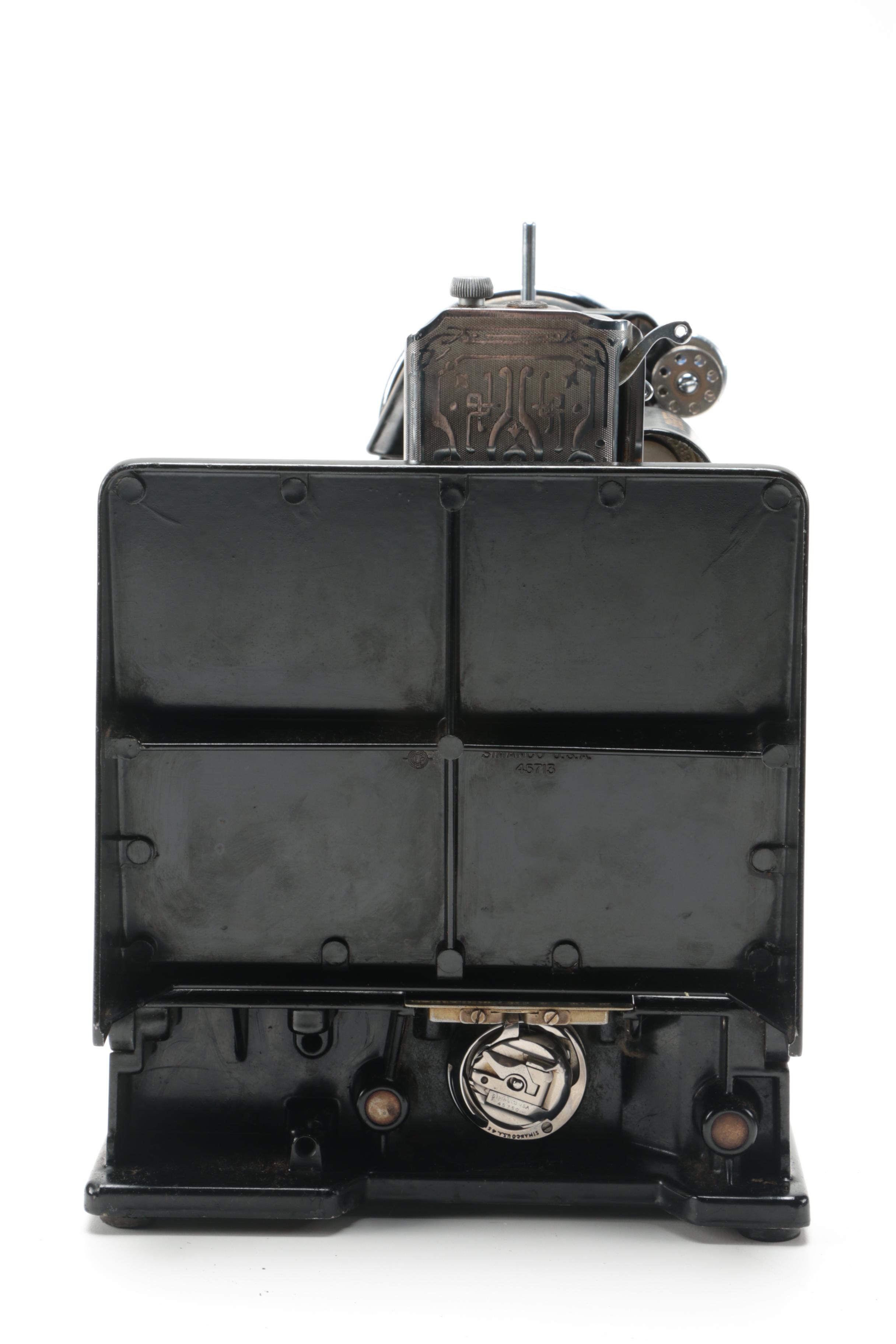 Singer Sewing Machine with Case and Accessories