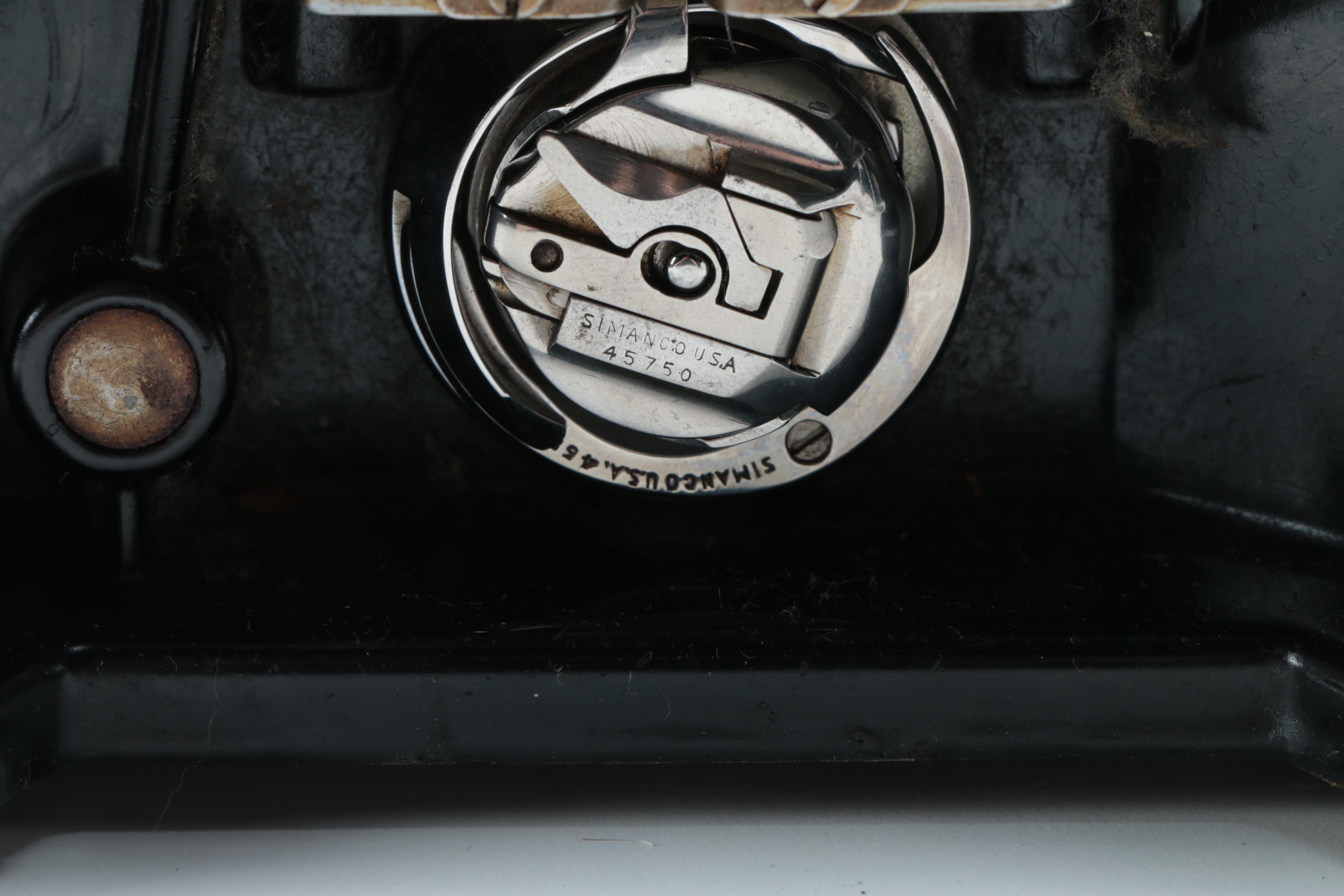 Singer Sewing Machine with Case and Accessories