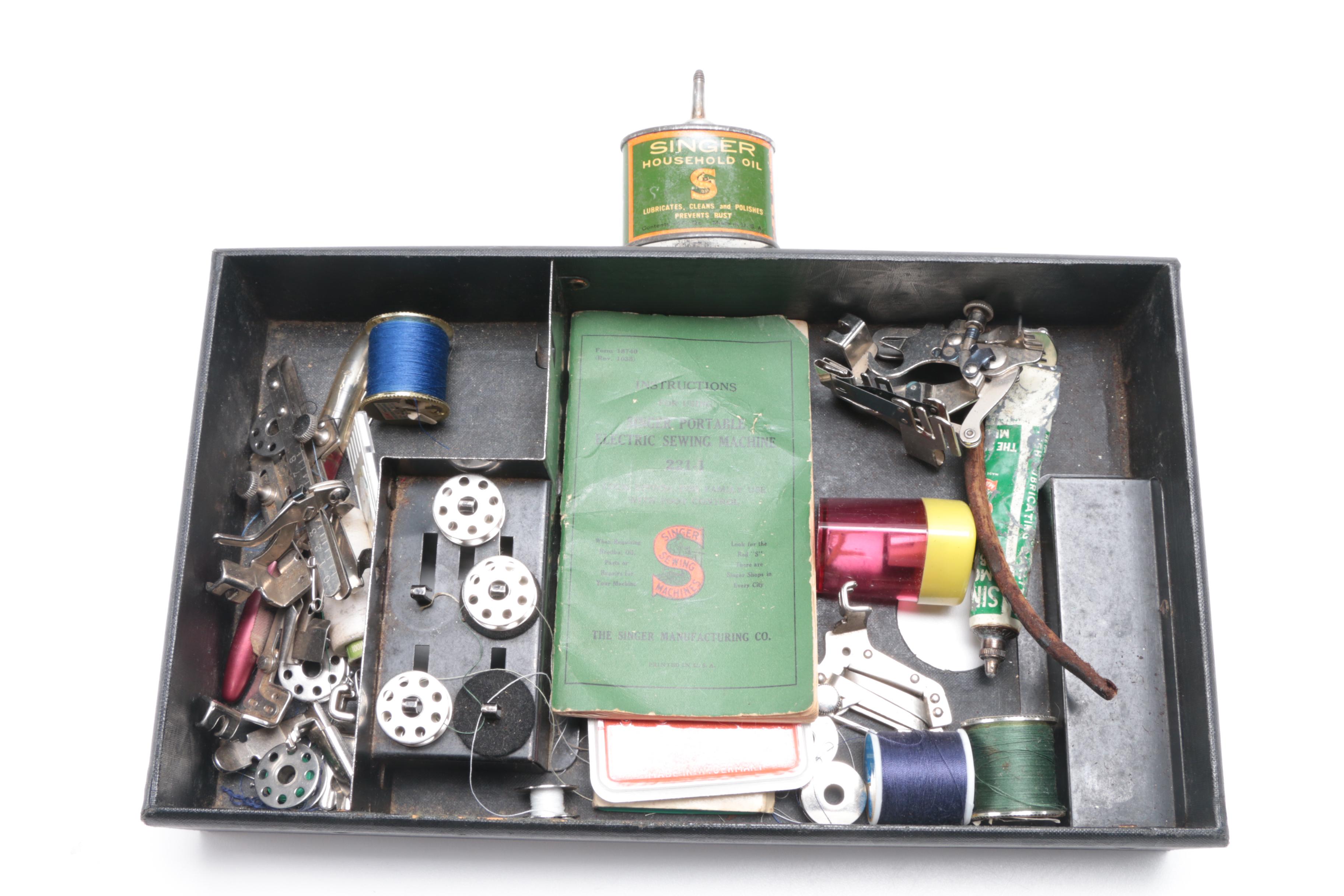 Singer Sewing Machine with Case and Accessories