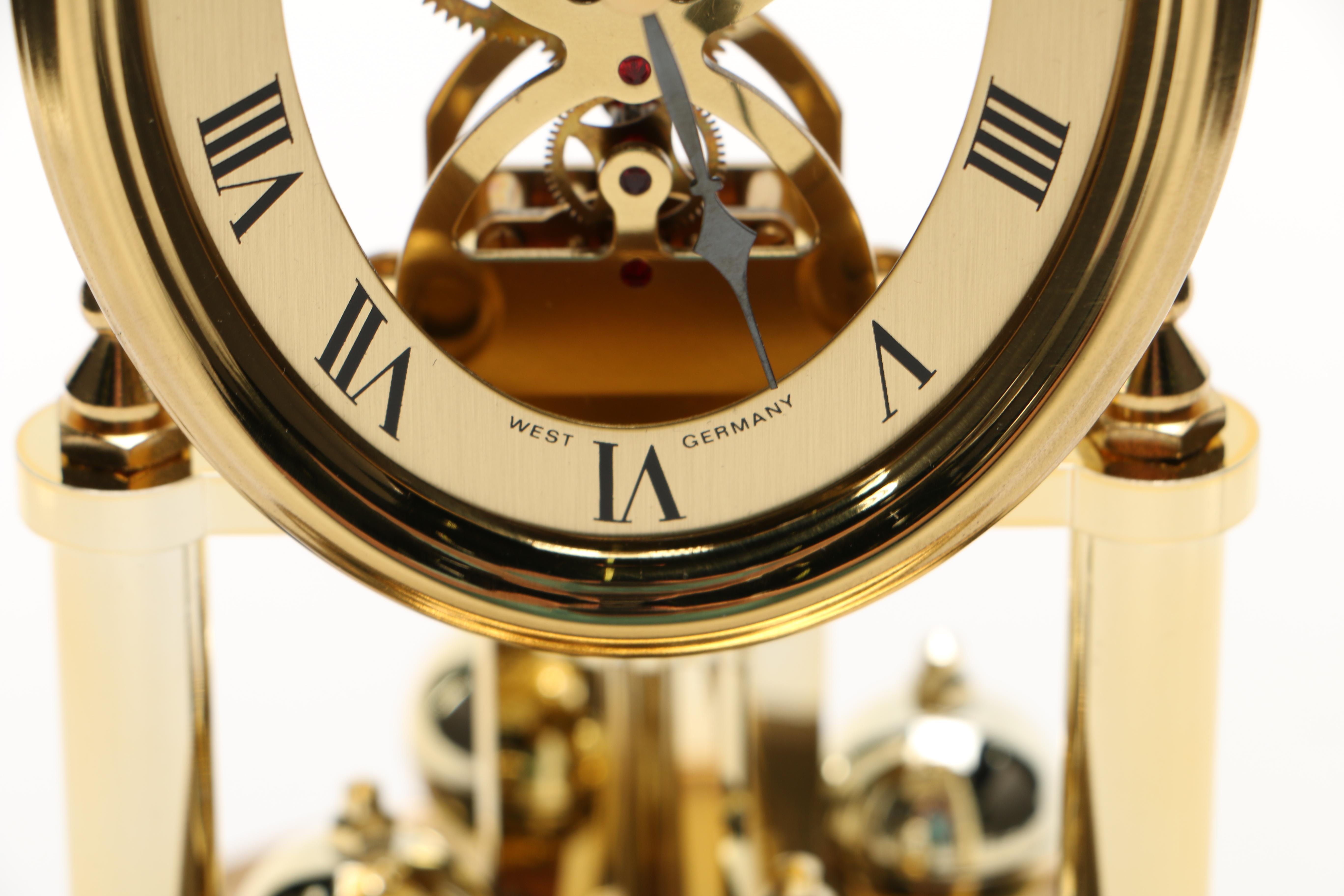 Brass and Clear Glass Clocks