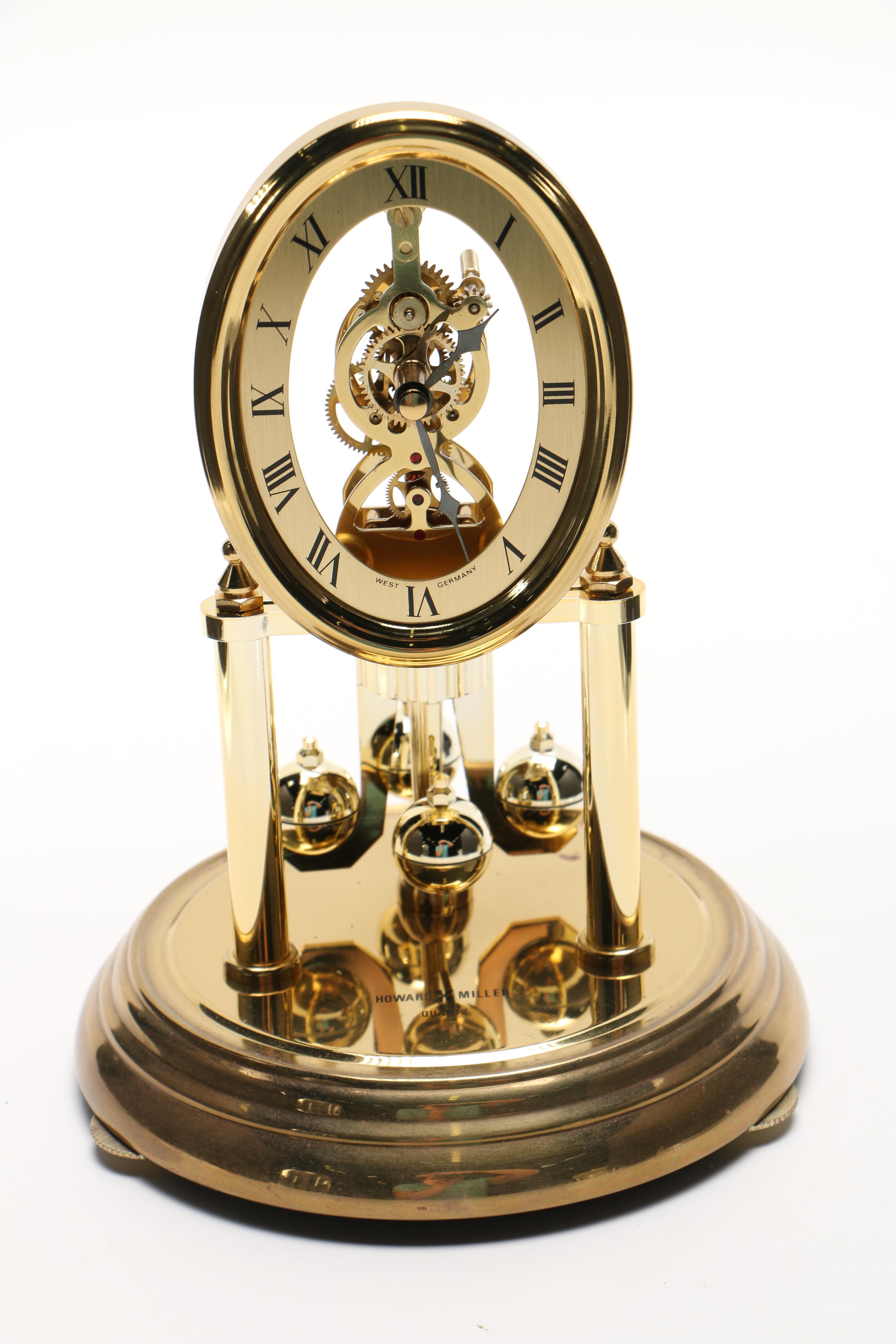 Brass and Clear Glass Clocks