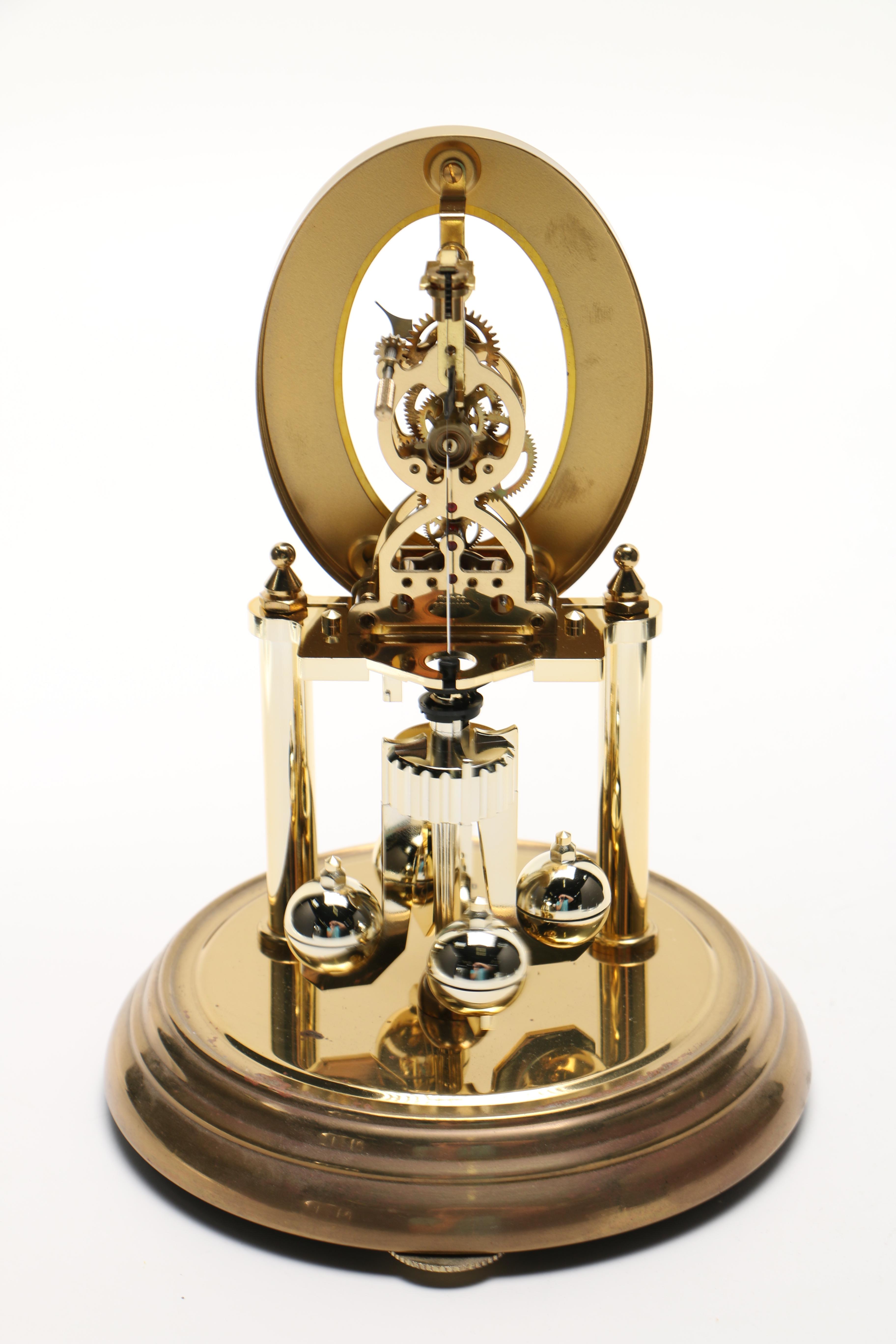 Brass and Clear Glass Clocks