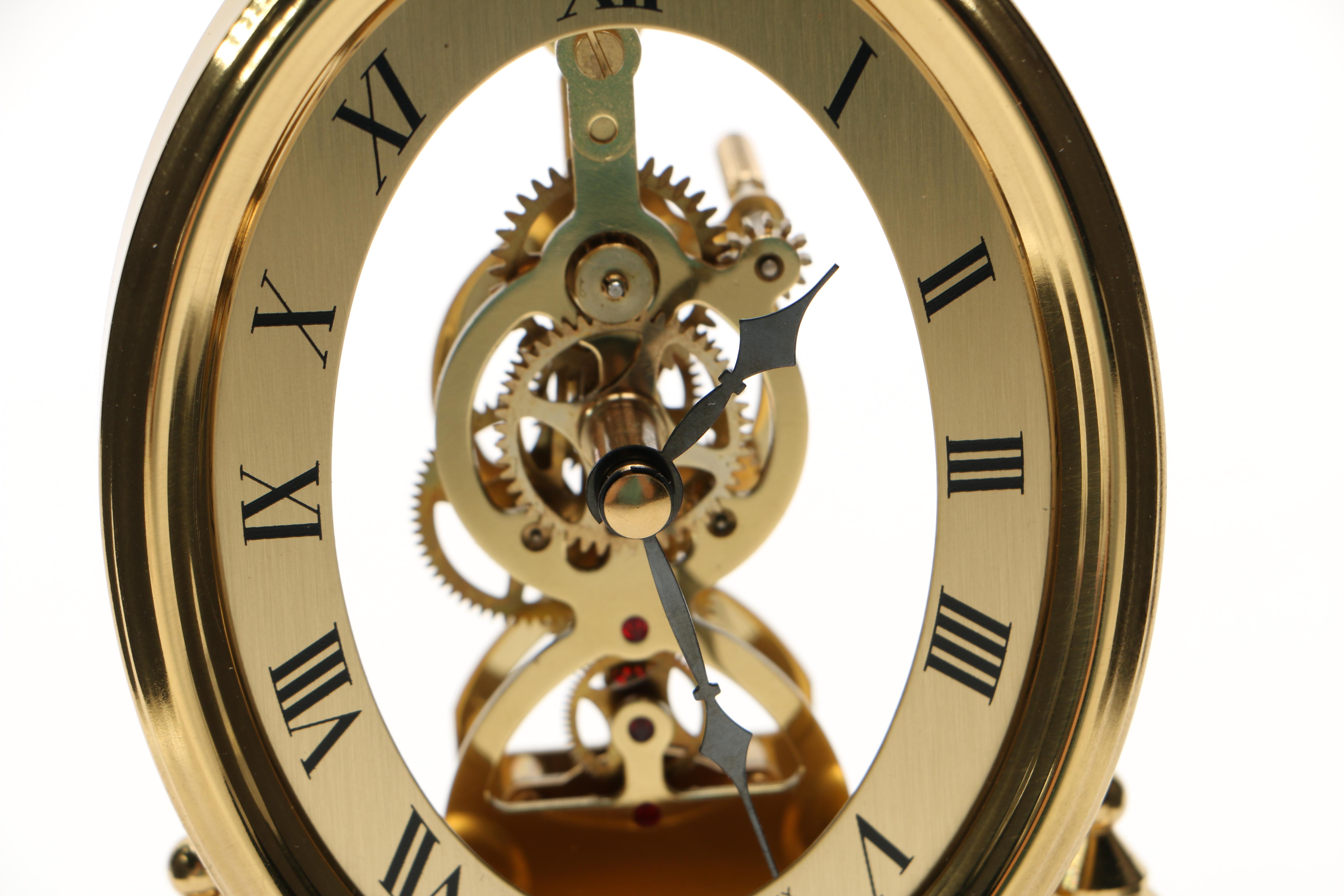 Brass and Clear Glass Clocks