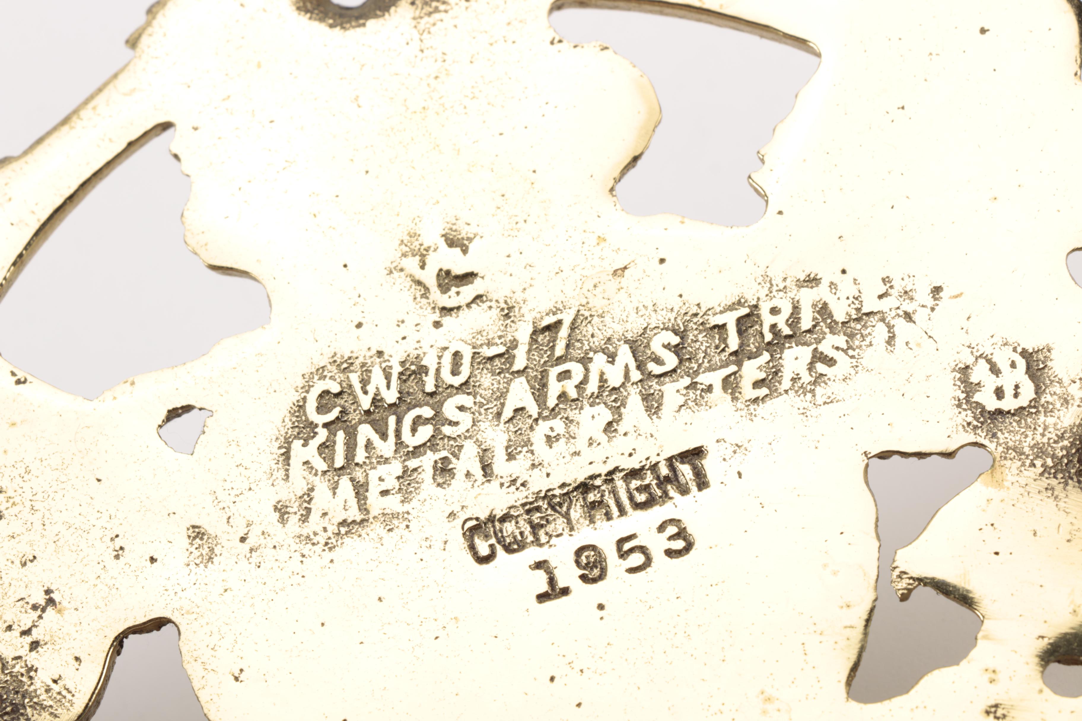 Copyright 1953 Brass Kings Arms Trivet