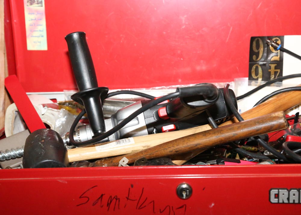 Large Collection of Tools and Ladders