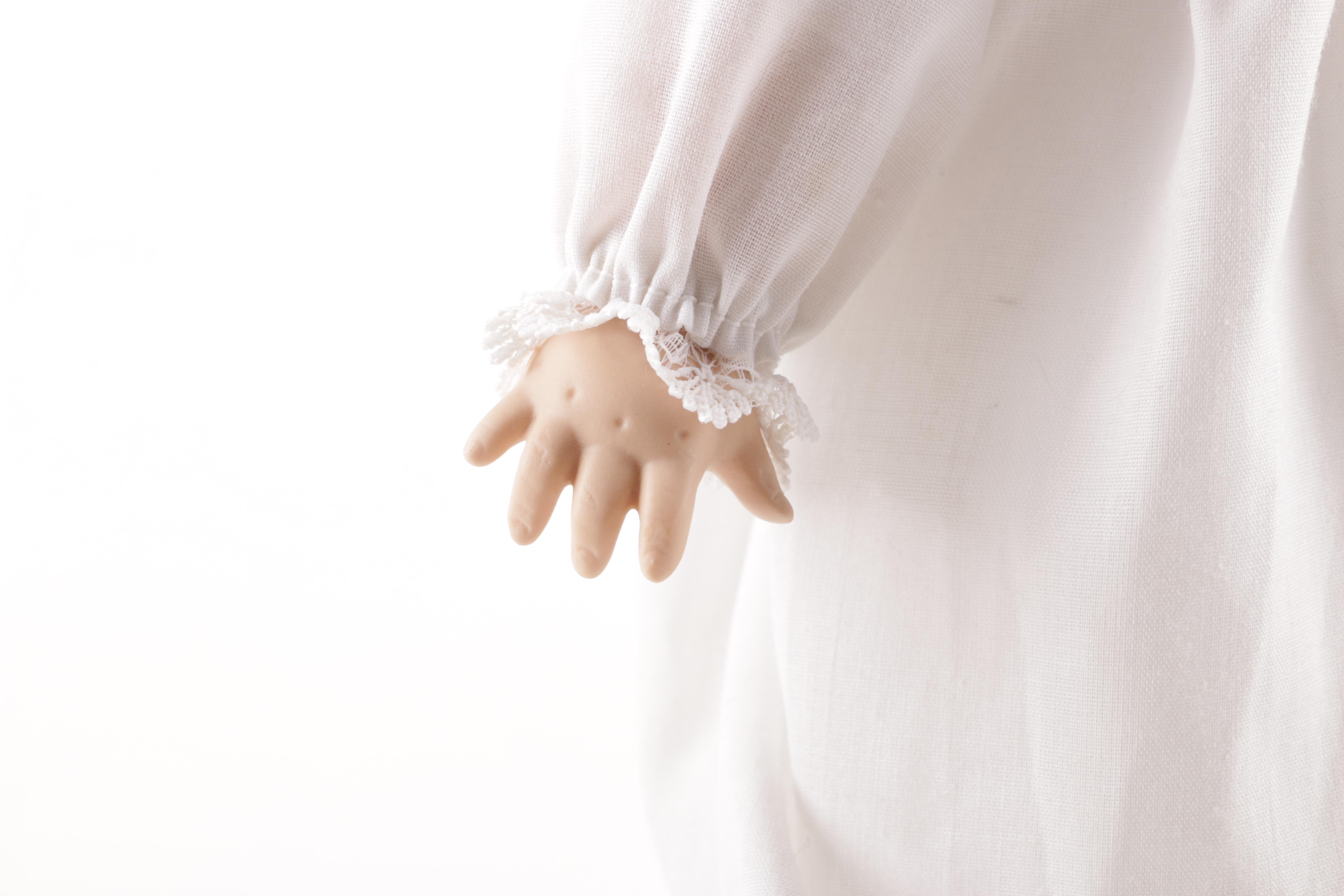 Collection of Porcelain Dolls