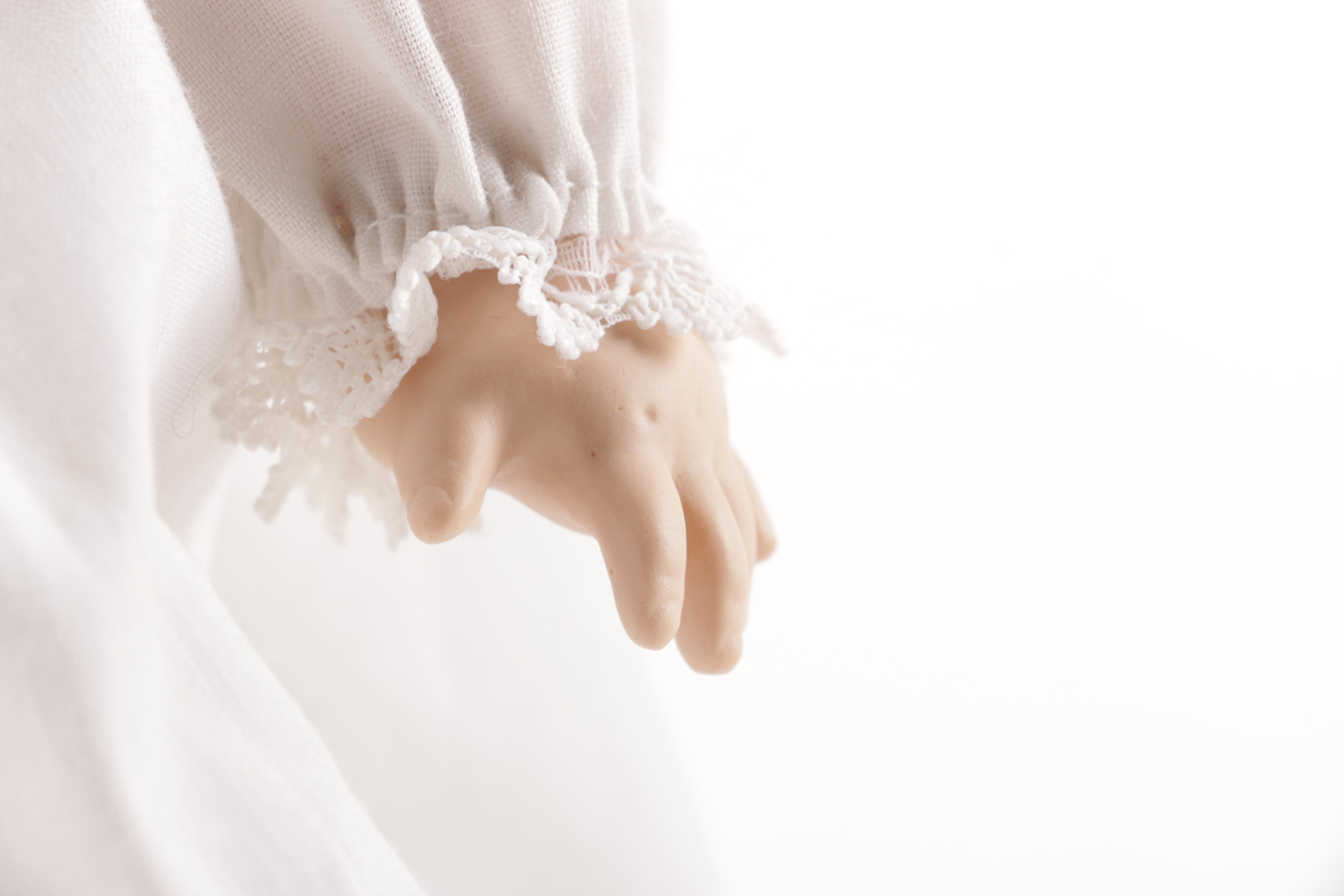 Collection of Porcelain Dolls