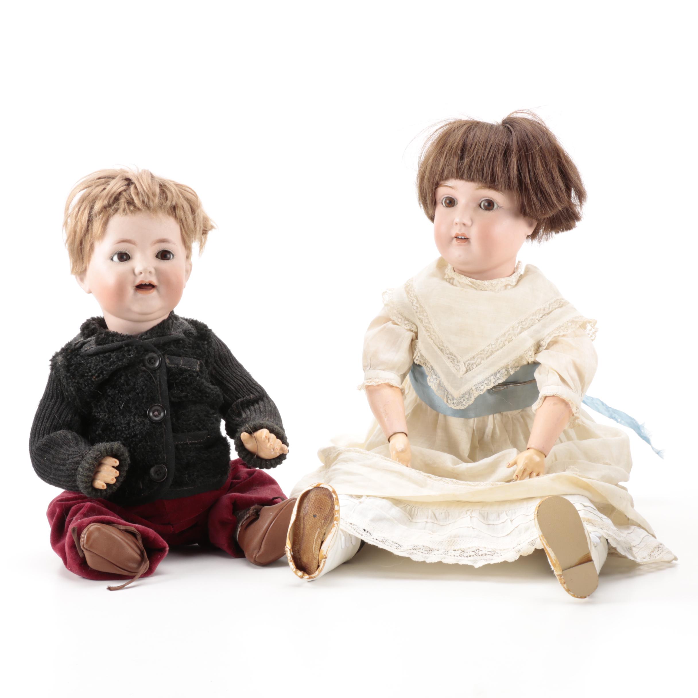 Pair of Bisque Porcelain Dolls