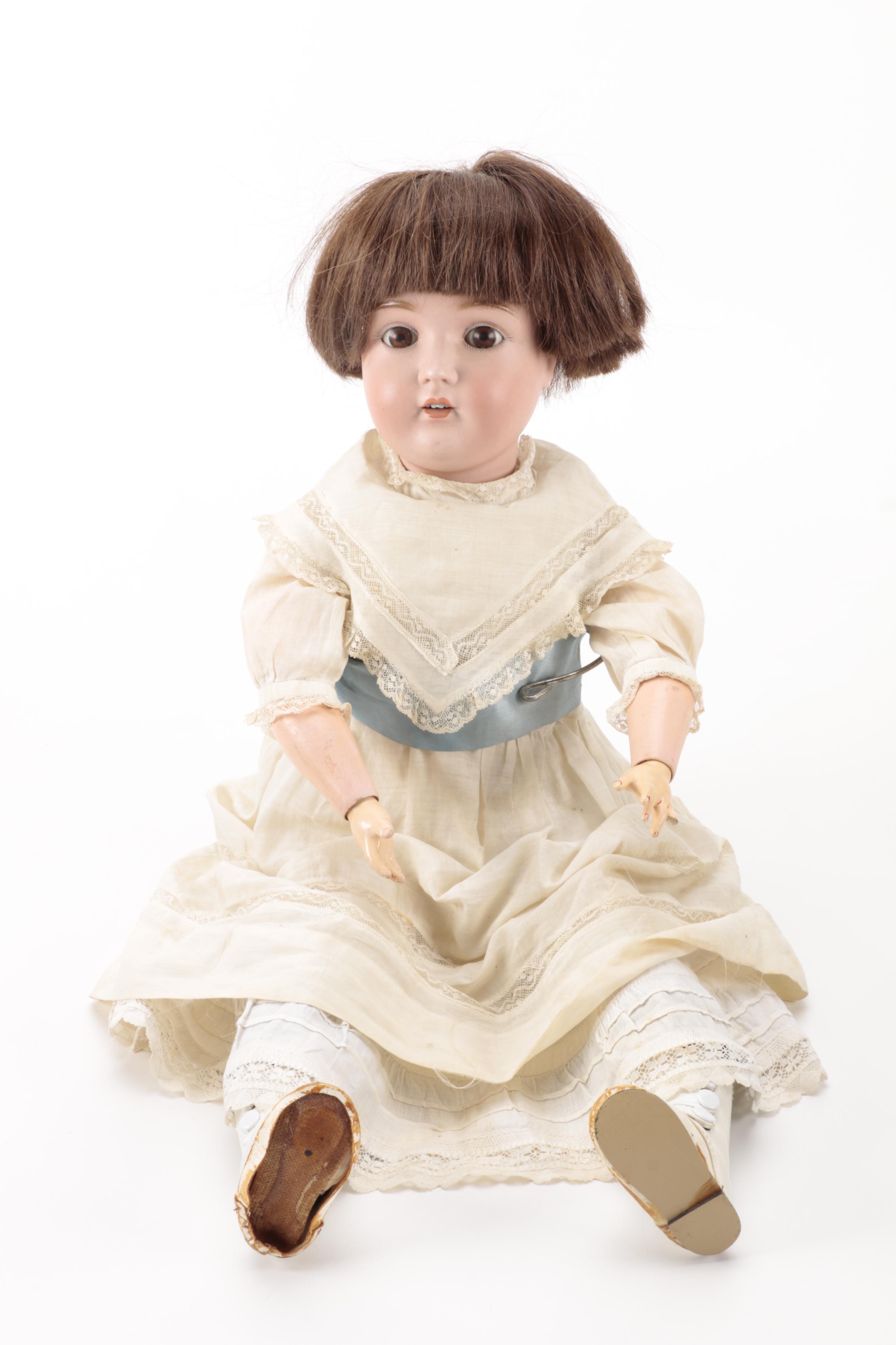 Pair of Bisque Porcelain Dolls