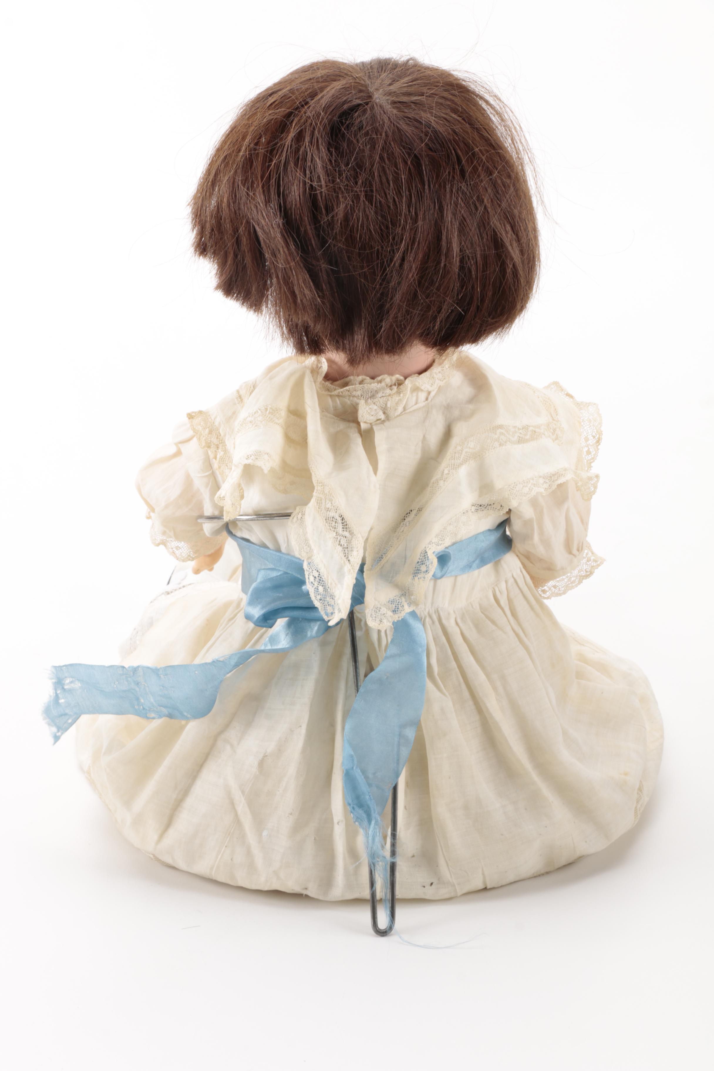 Pair of Bisque Porcelain Dolls