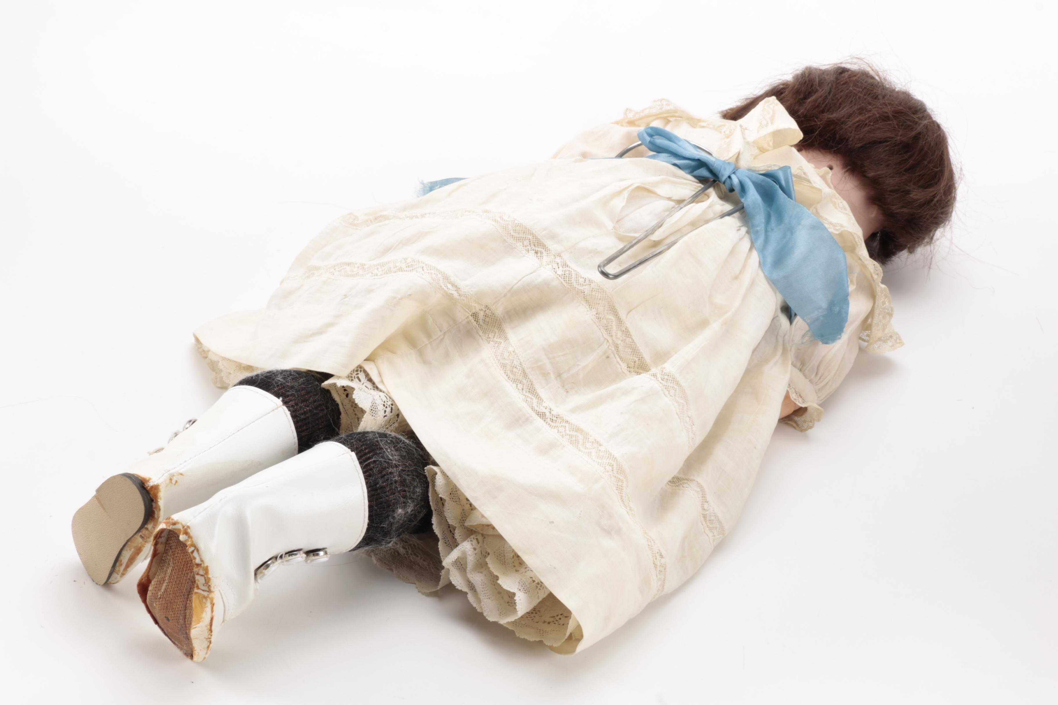 Pair of Bisque Porcelain Dolls