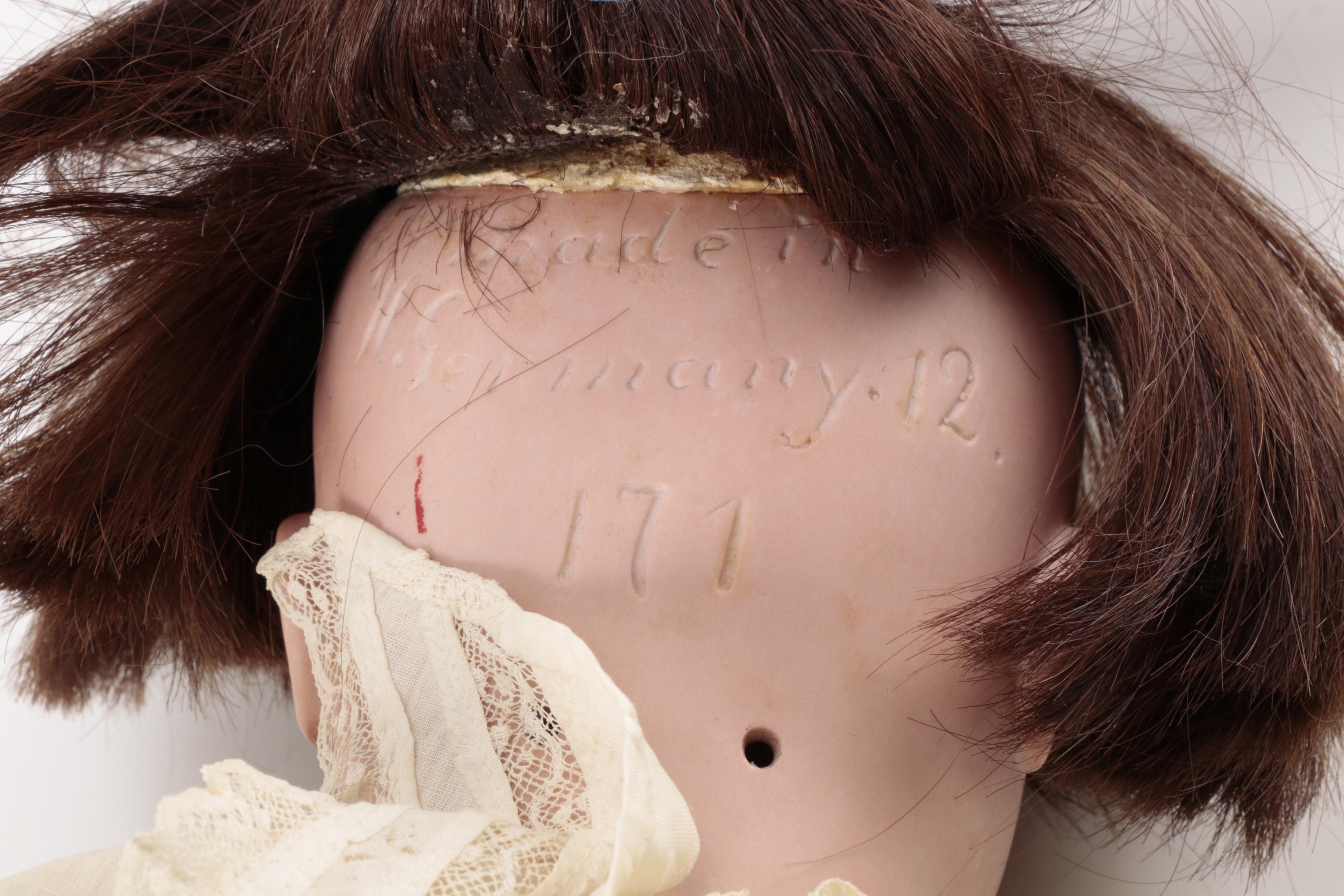 Pair of Bisque Porcelain Dolls