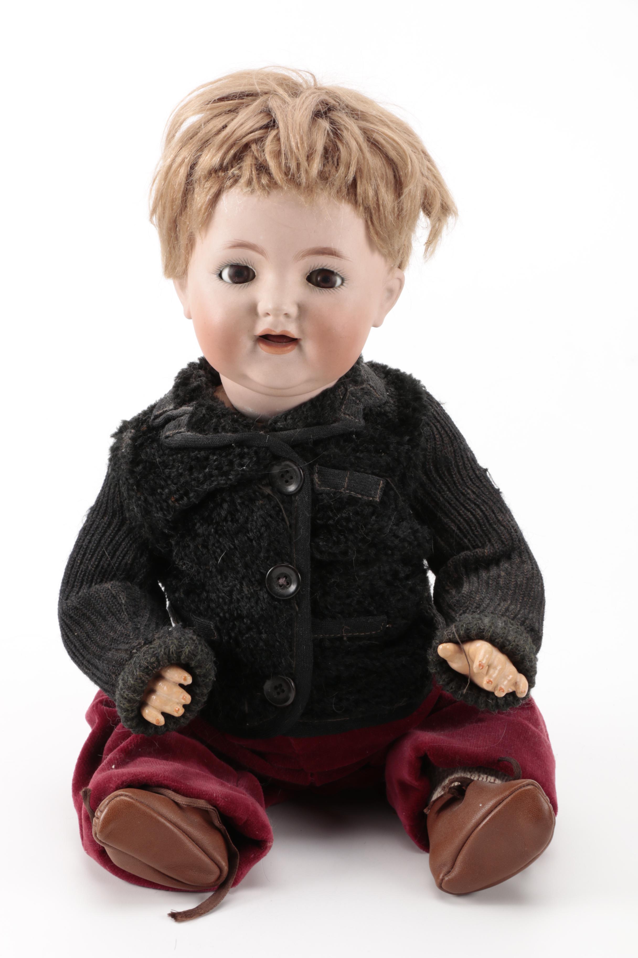 Pair of Bisque Porcelain Dolls