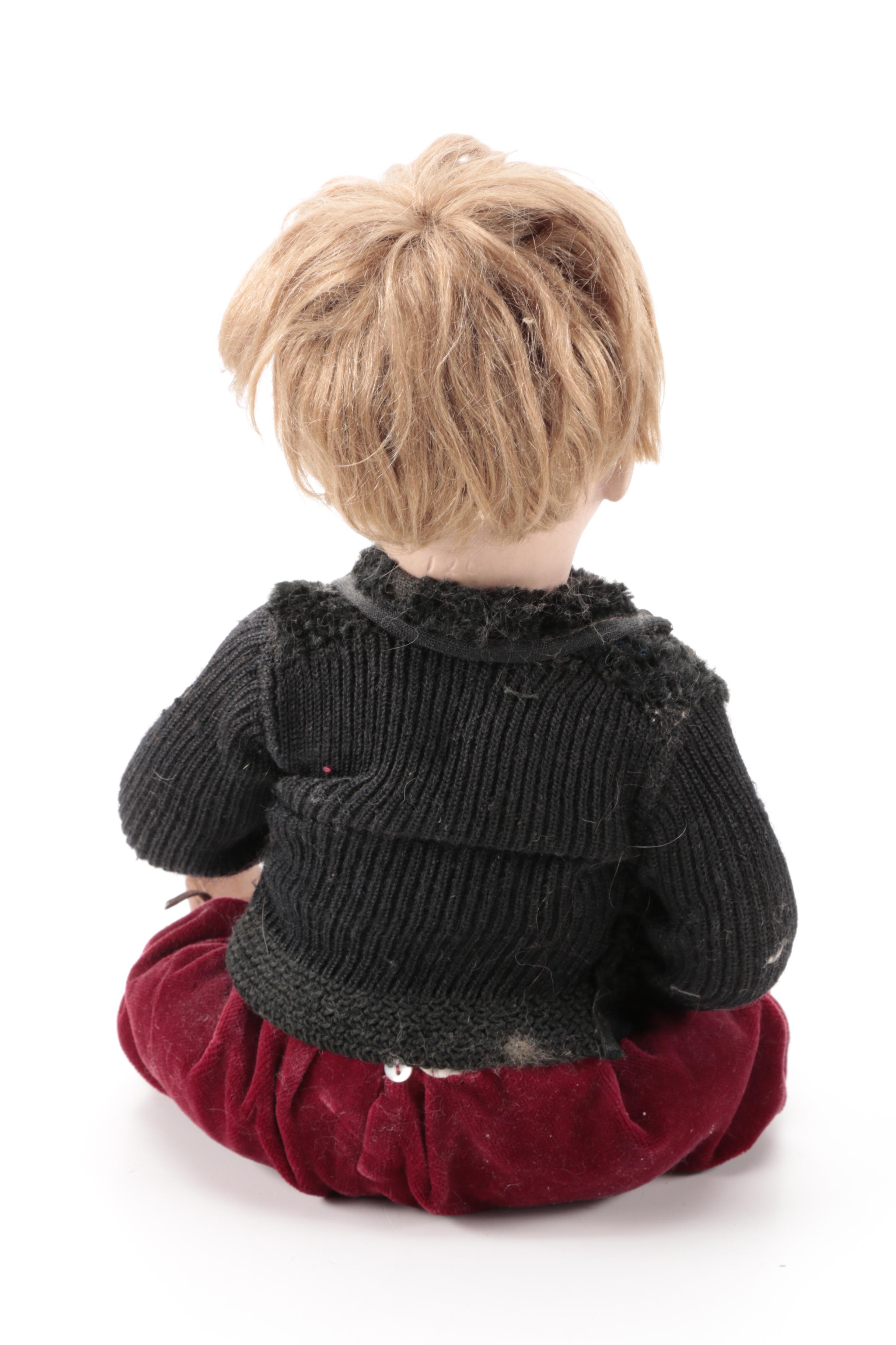 Pair of Bisque Porcelain Dolls