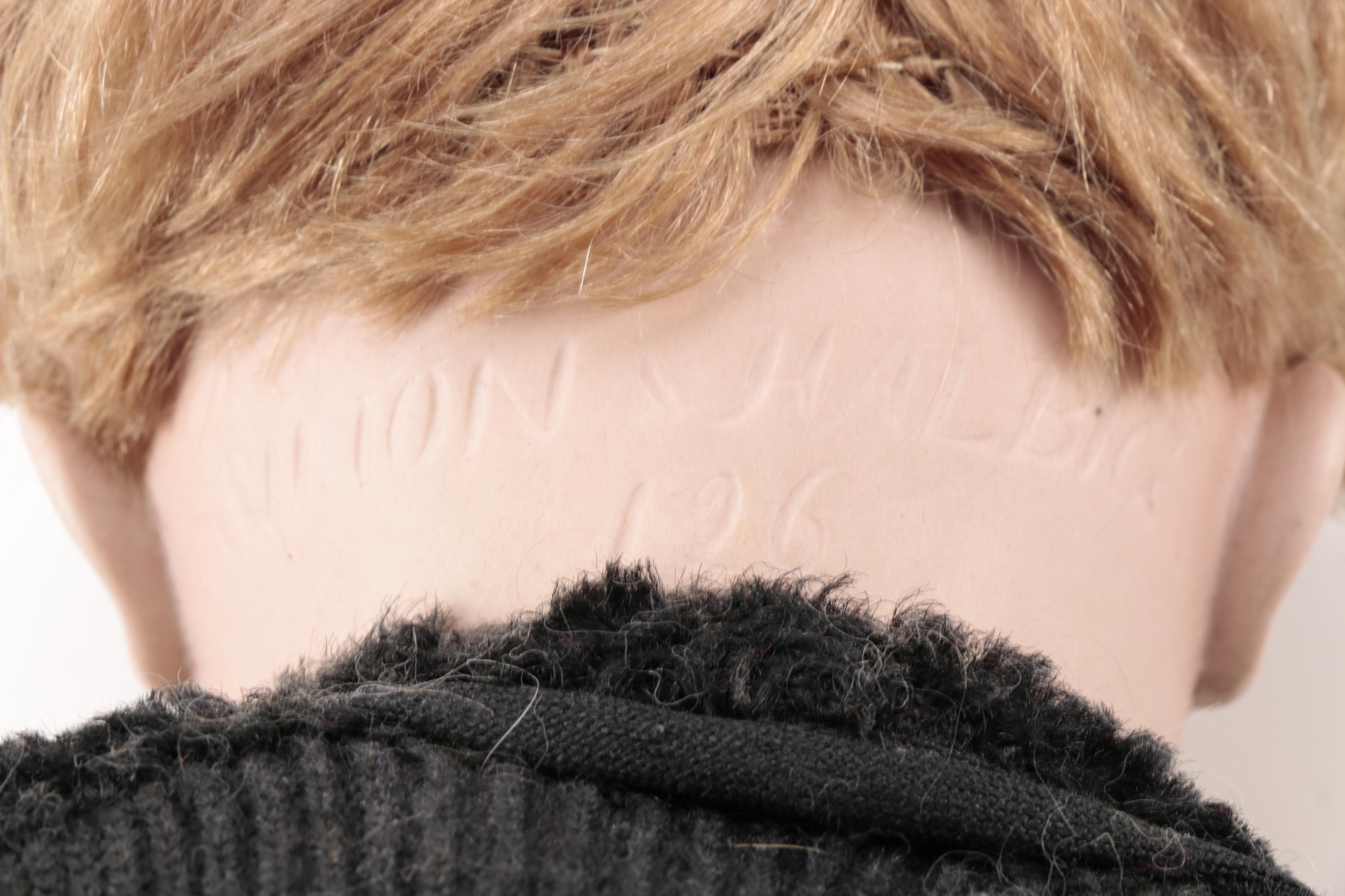 Pair of Bisque Porcelain Dolls