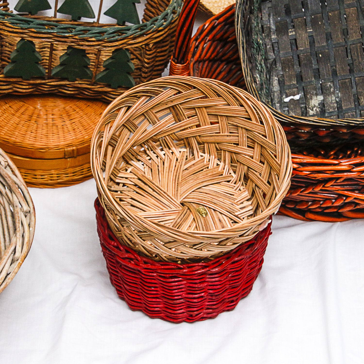 Collection of Various-Sized Straw Baskets