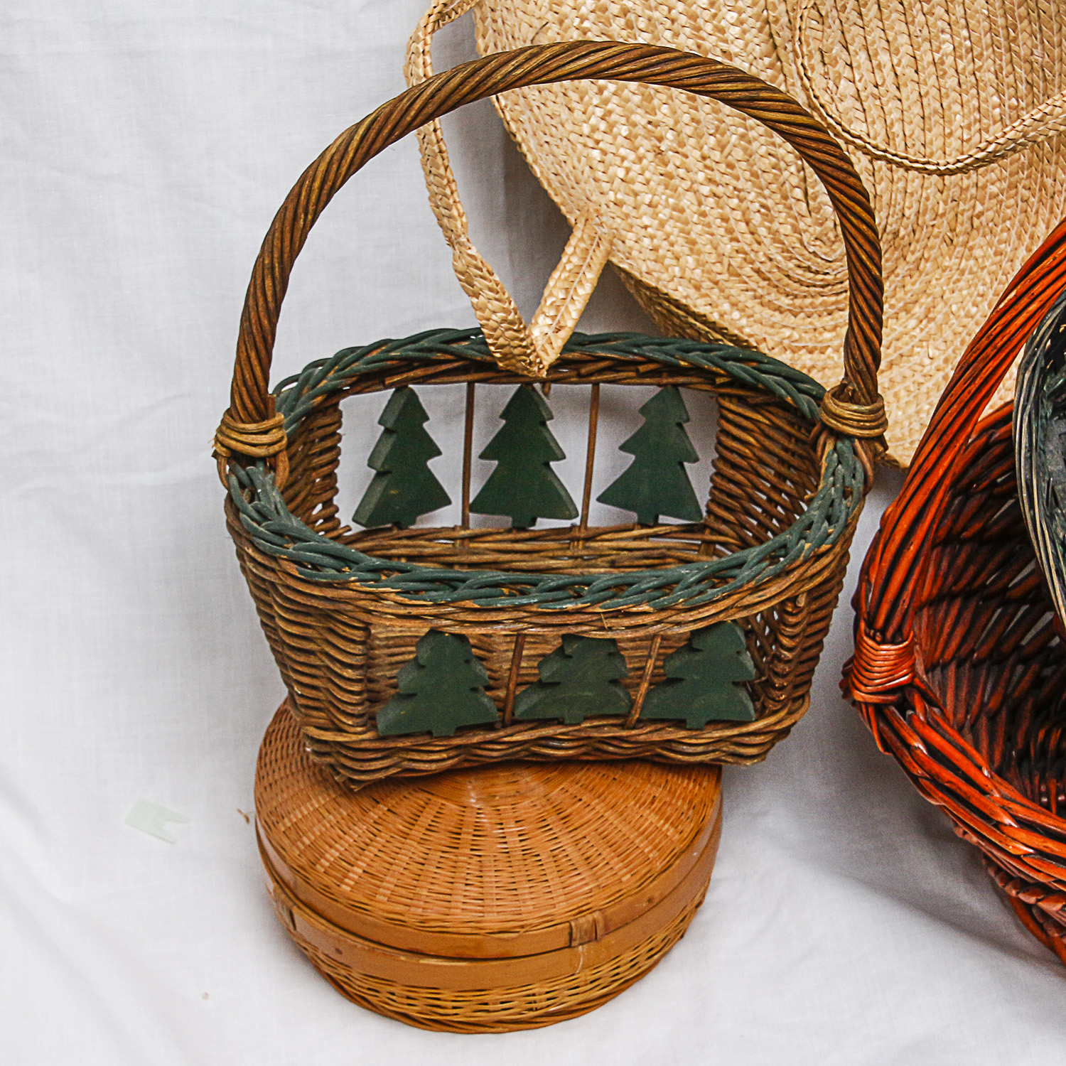 Collection of Various-Sized Straw Baskets