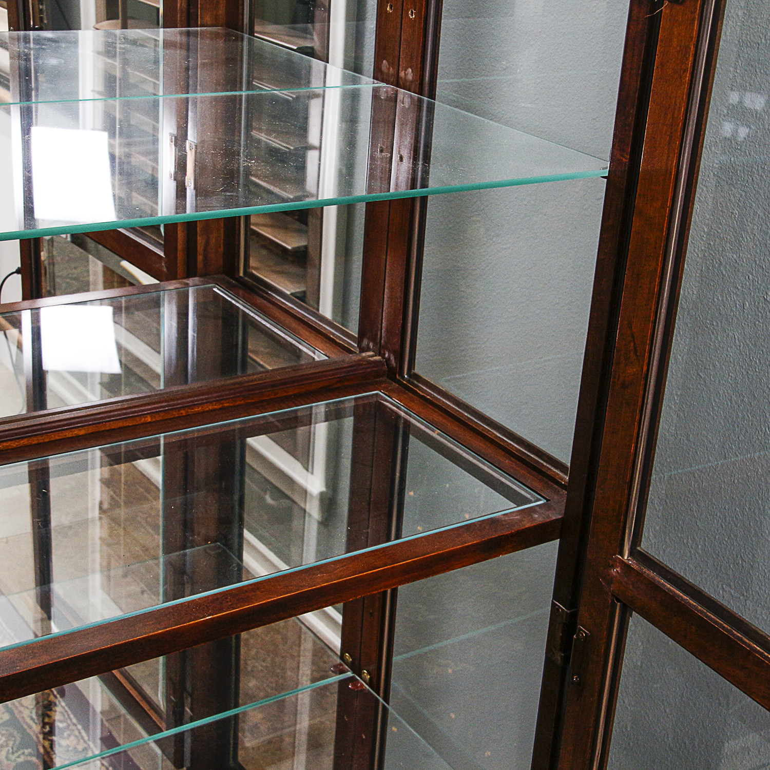 Lighted Curio Cabinet with Broken Arch Pediment