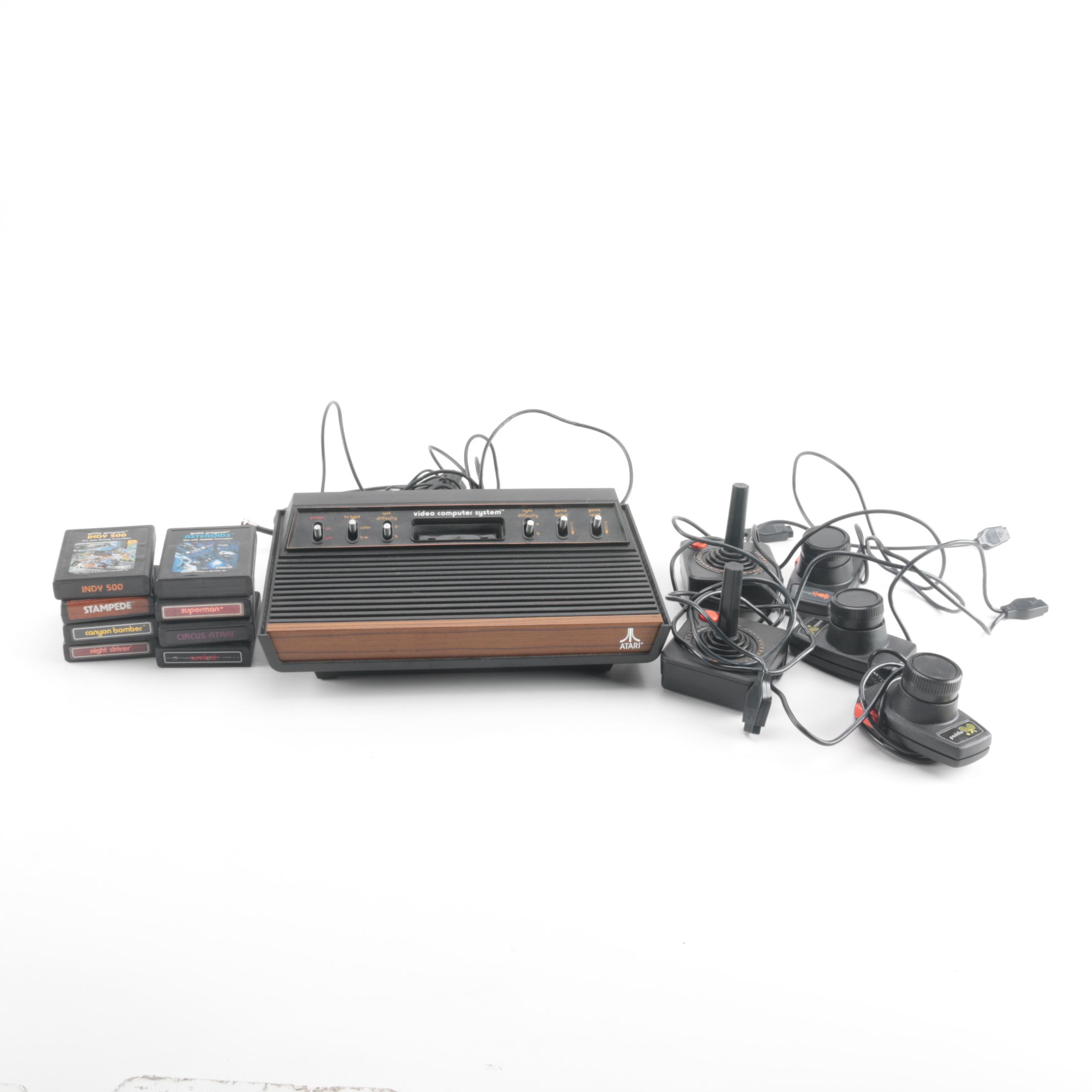 Atari 2600 Console with Games and Accessories