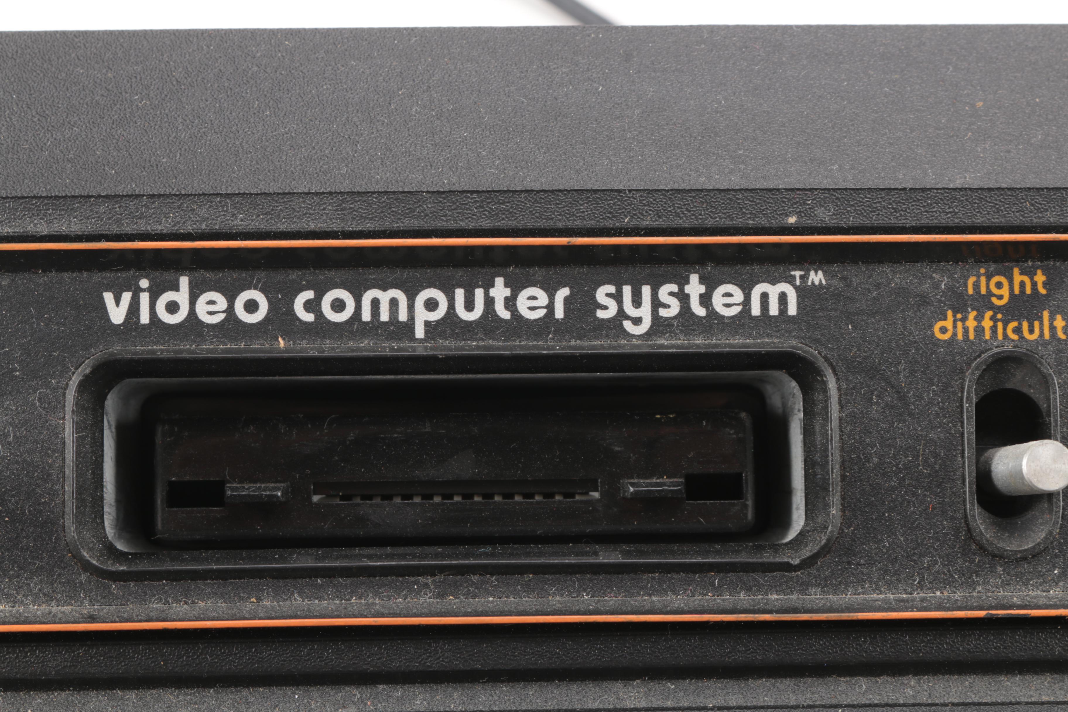 Atari 2600 Console with Games and Accessories