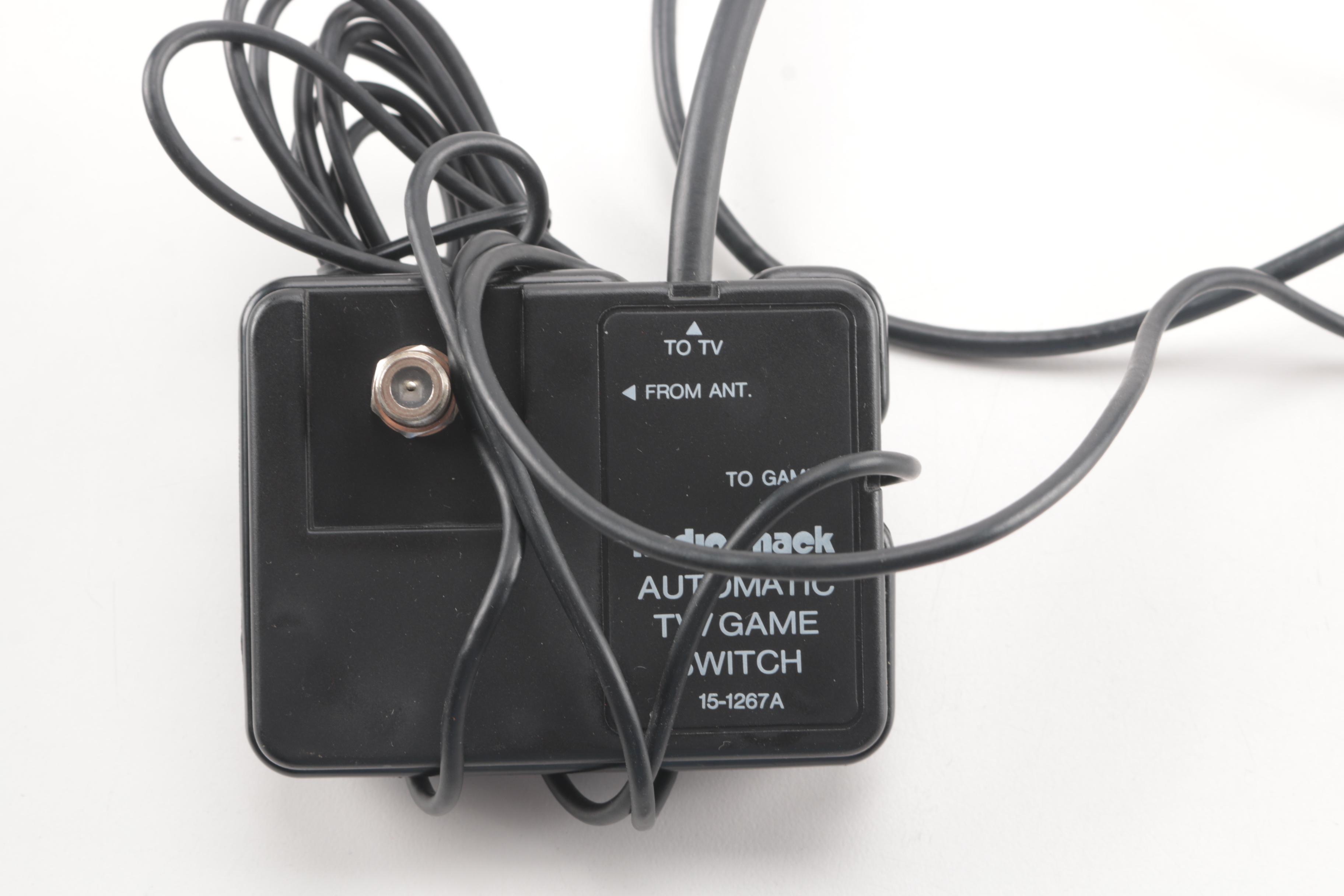 Atari 2600 Console with Games and Accessories