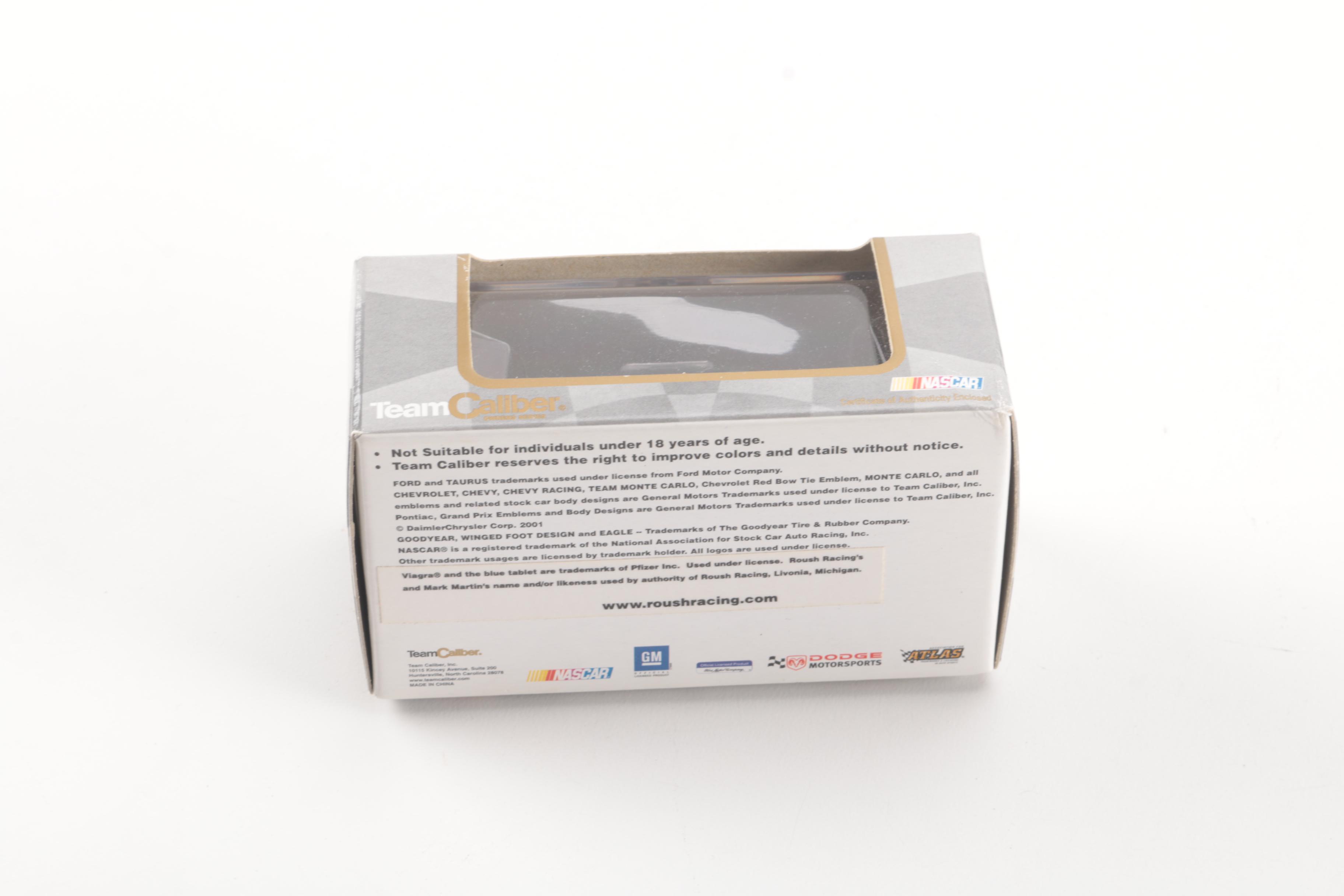 Collection of Eight Model Cars and One Metal Plaque