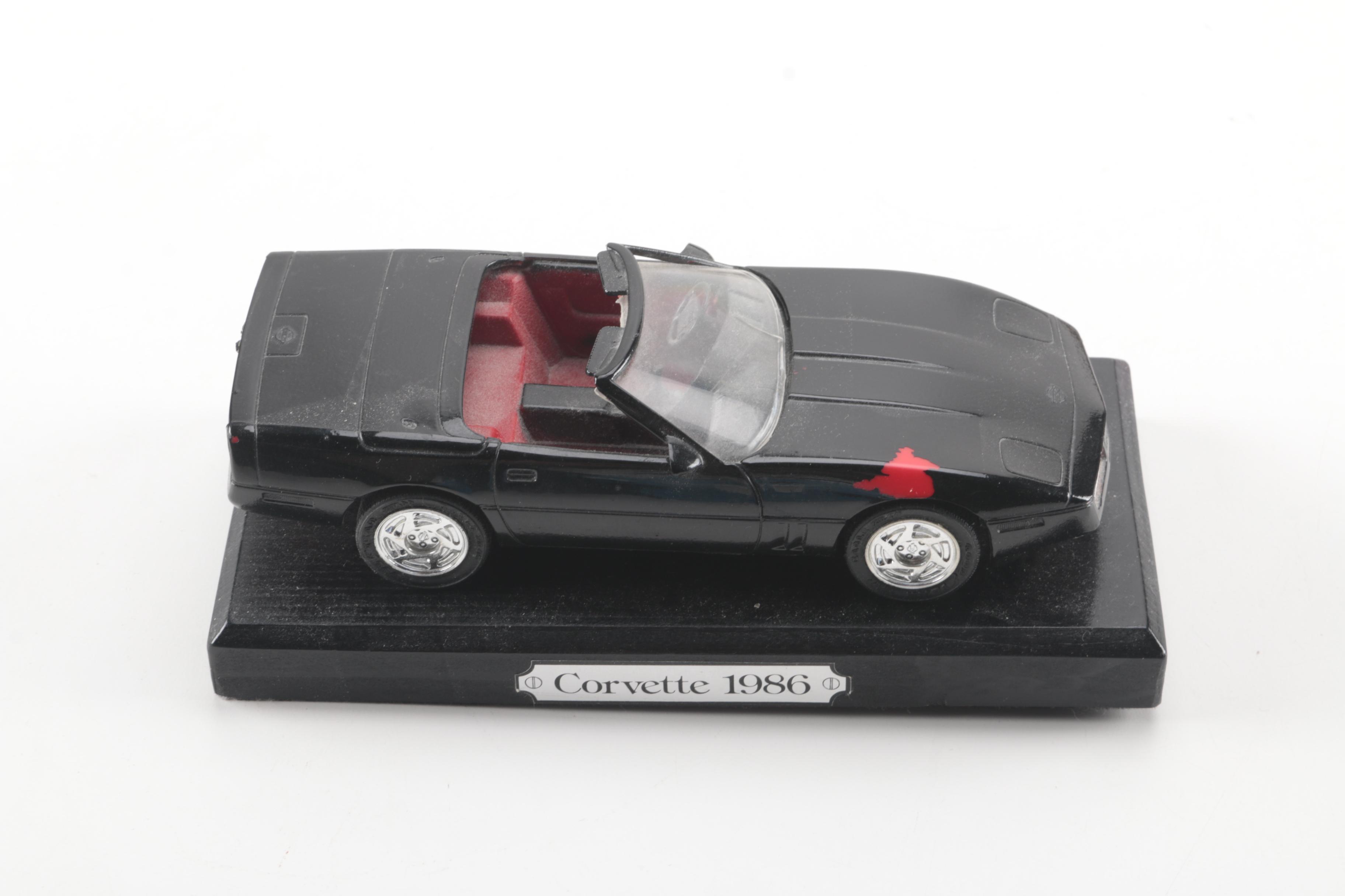 Collection of Eight Model Cars and One Metal Plaque