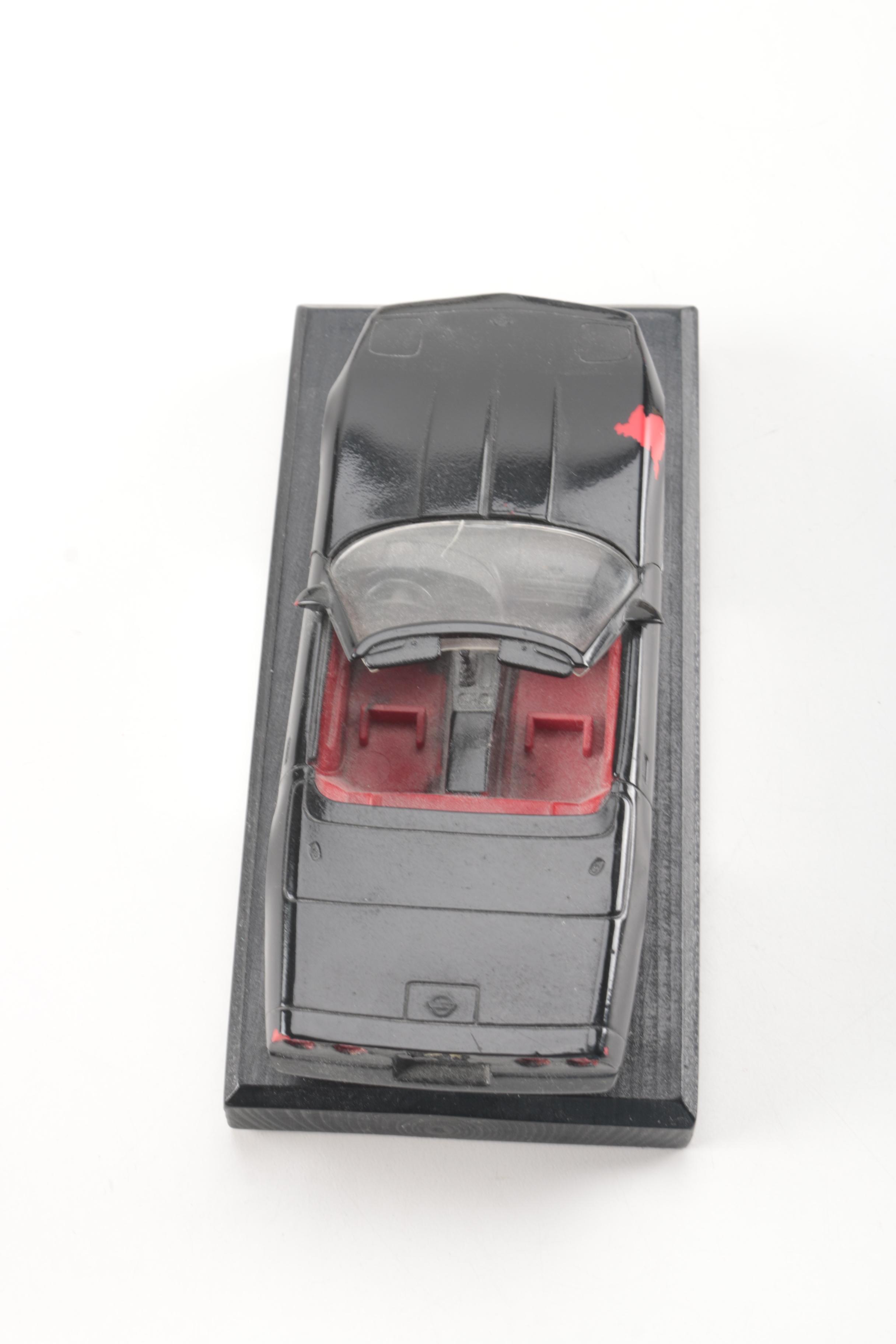 Collection of Eight Model Cars and One Metal Plaque