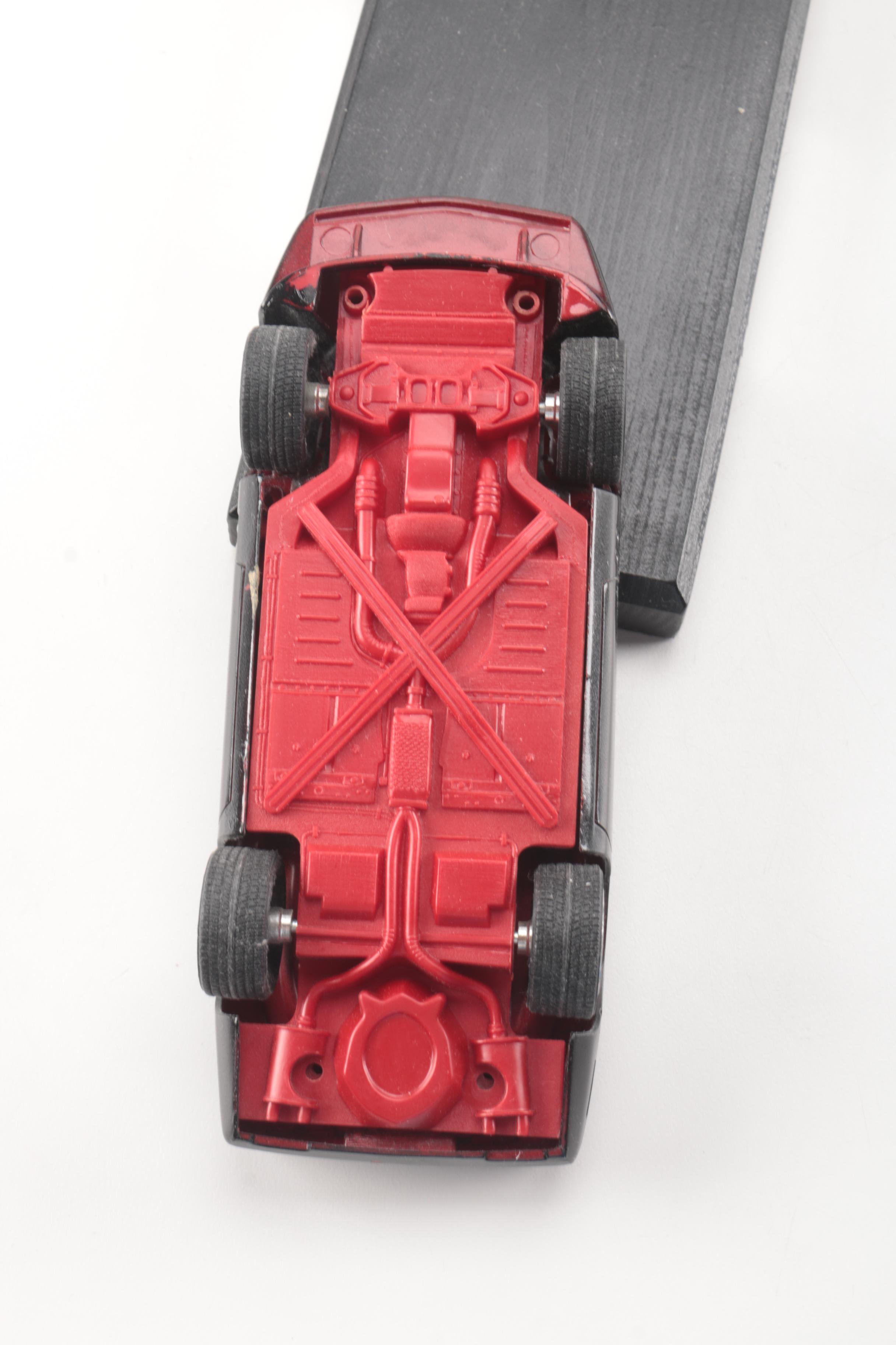 Collection of Eight Model Cars and One Metal Plaque