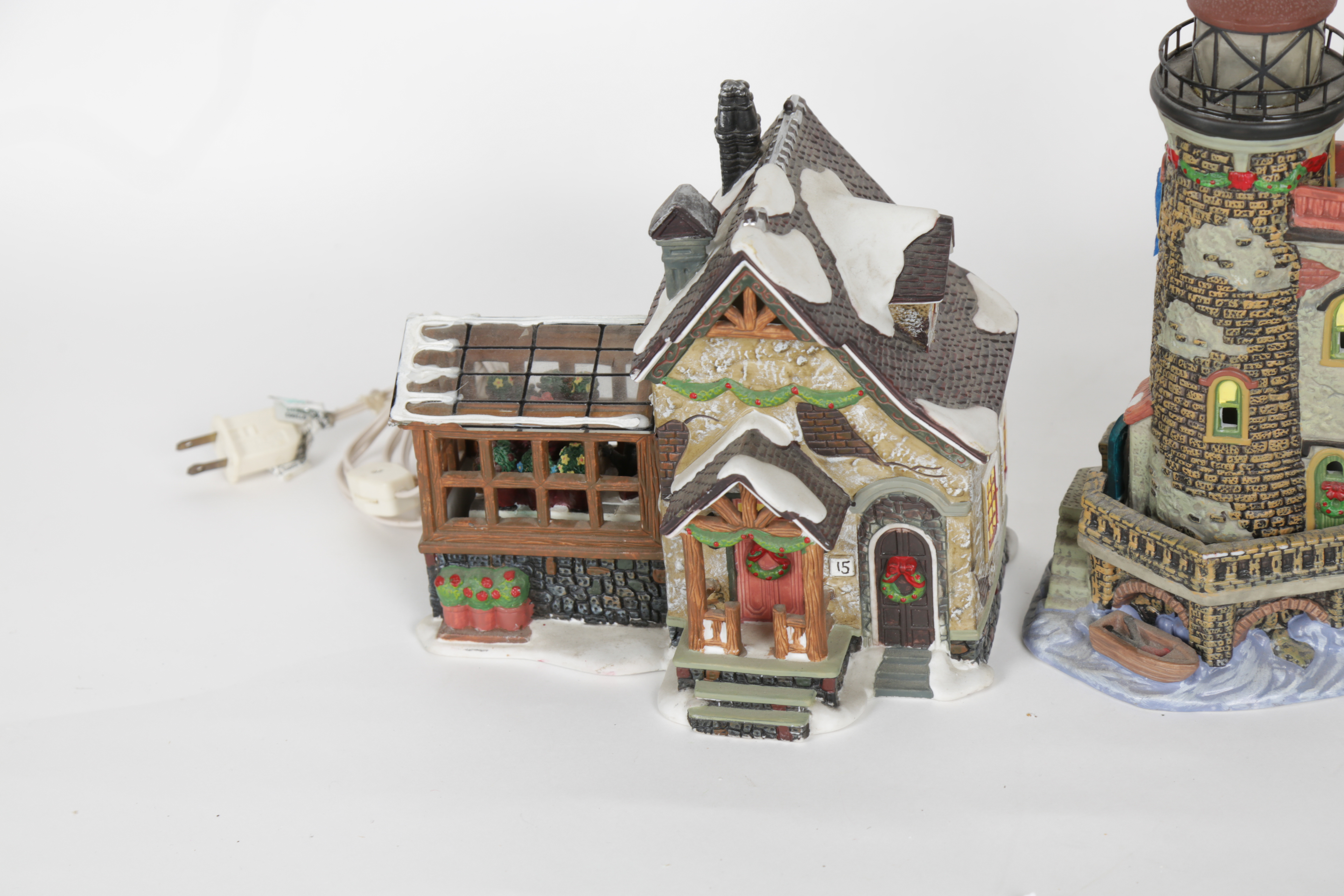 Collection of "Santa's Workbench Collection" Illuminated Houses
