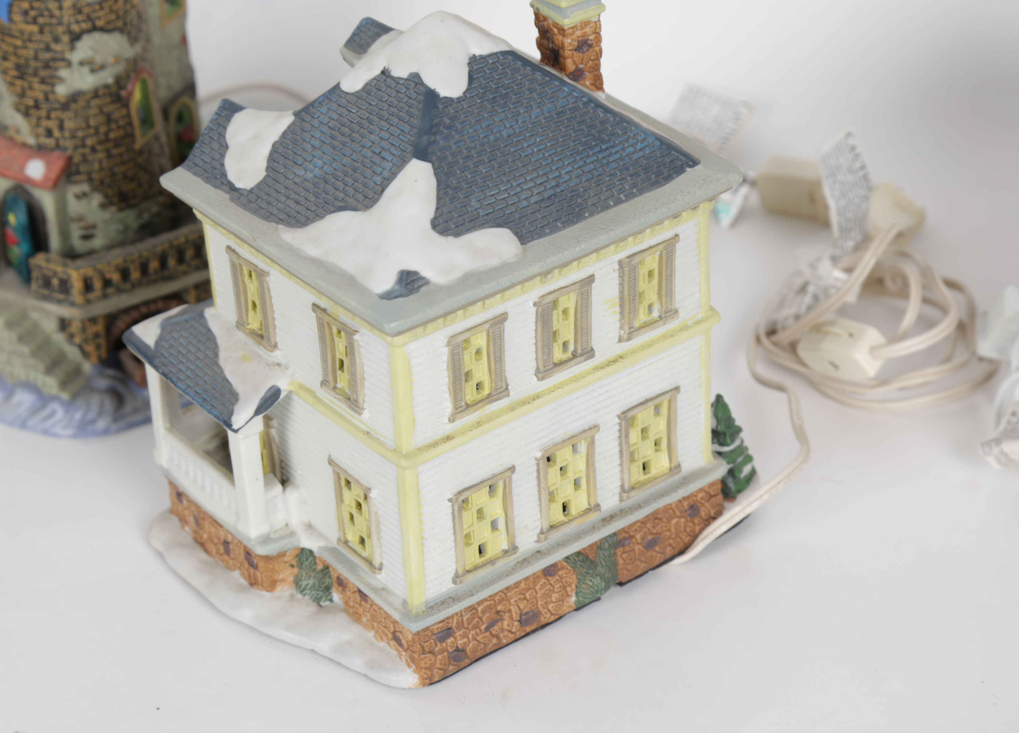 Collection of "Santa's Workbench Collection" Illuminated Houses