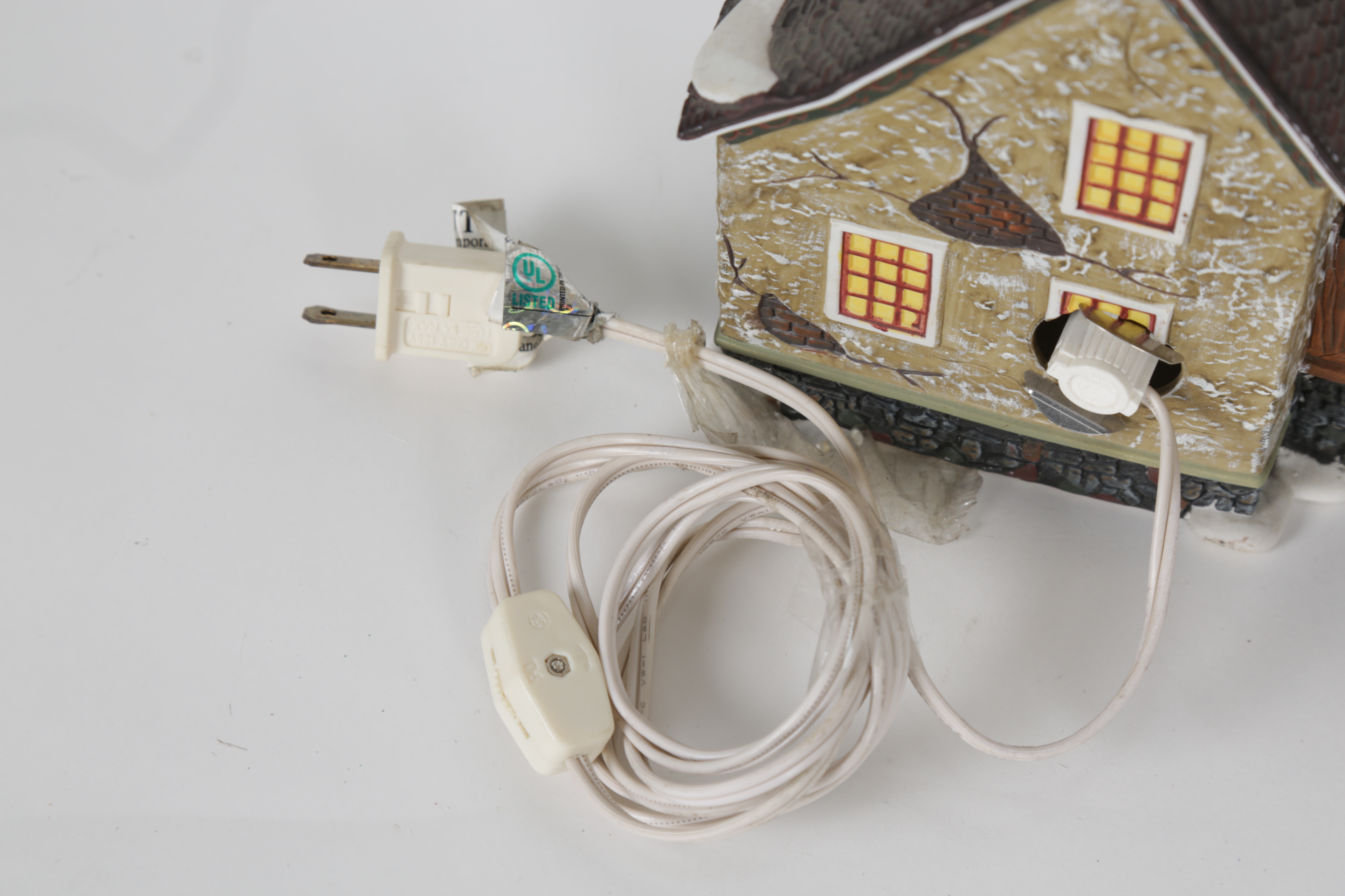 Collection of "Santa's Workbench Collection" Illuminated Houses