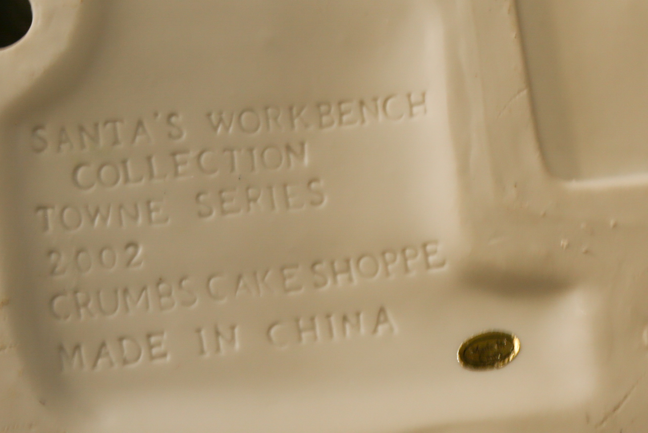 Collection of "Santa's Workbench Collection" Illuminated Houses