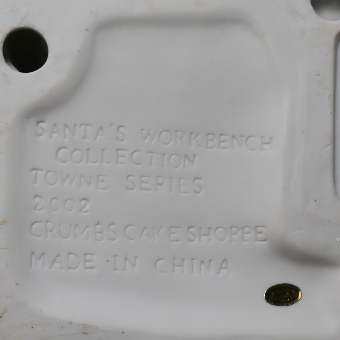 Collection of "Santa's Workbench Collection" Illuminated Houses