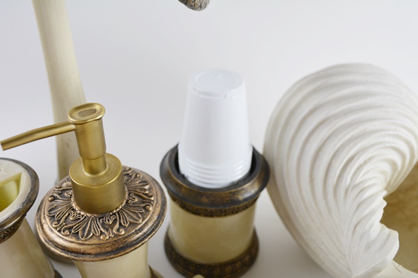 Cream and Bronze Tone Bathroom Accessory Collection