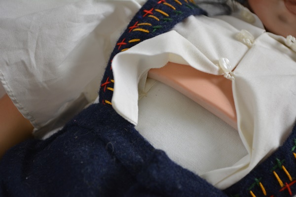 Vintage Jules N. Steiner "Kahlie" Hand Painted Reproduction Doll and a Porcelain Doll