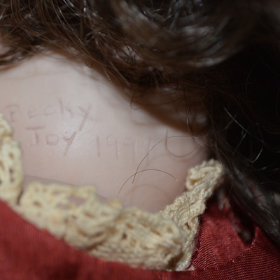 Vintage Jules N. Steiner "Kahlie" Hand Painted Reproduction Doll and a Porcelain Doll