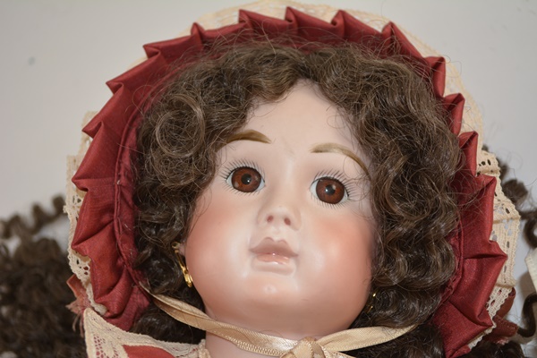 Vintage Jules N. Steiner "Kahlie" Hand Painted Reproduction Doll and a Porcelain Doll