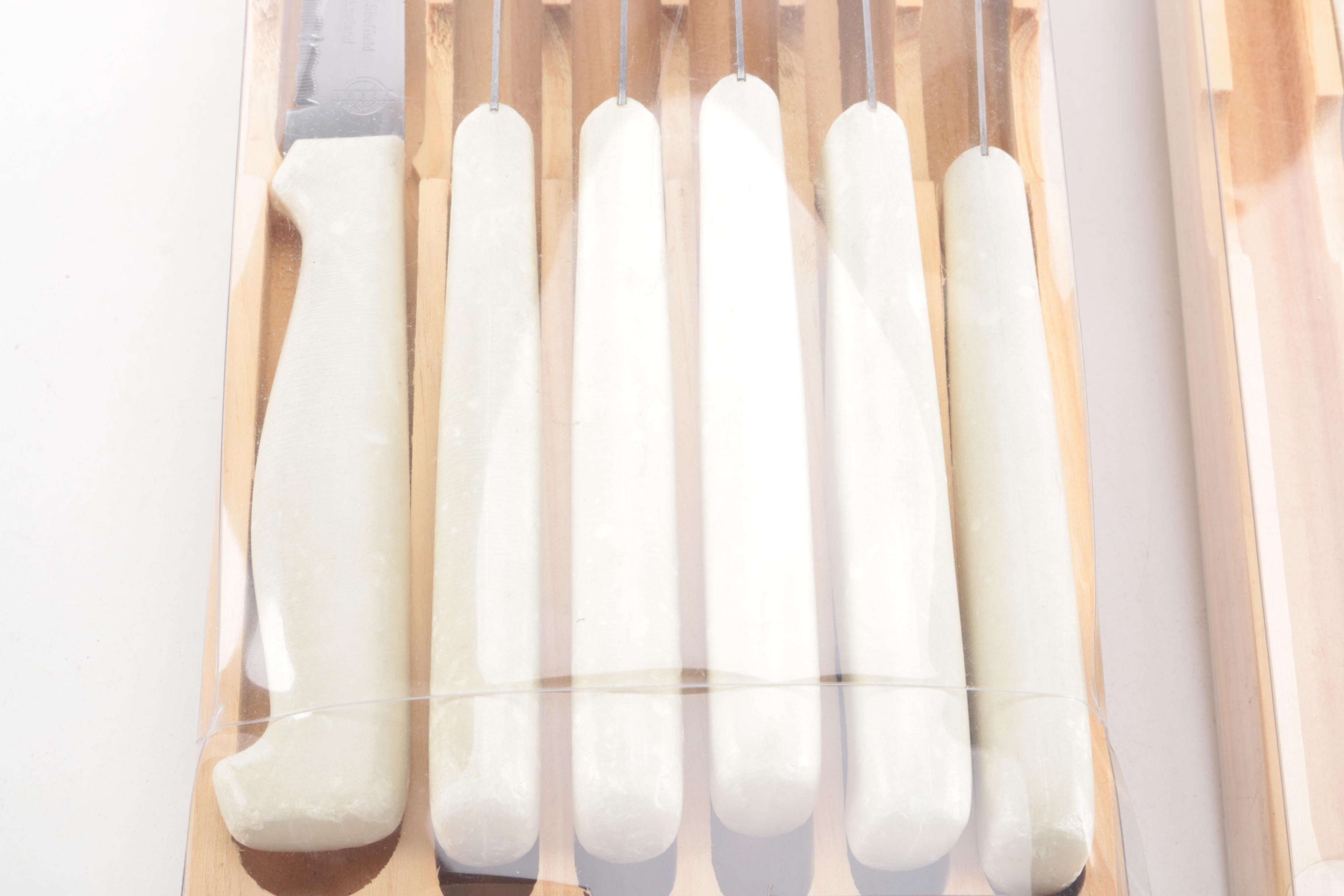 Collection of Knives and Silver Plate Serving Pieces