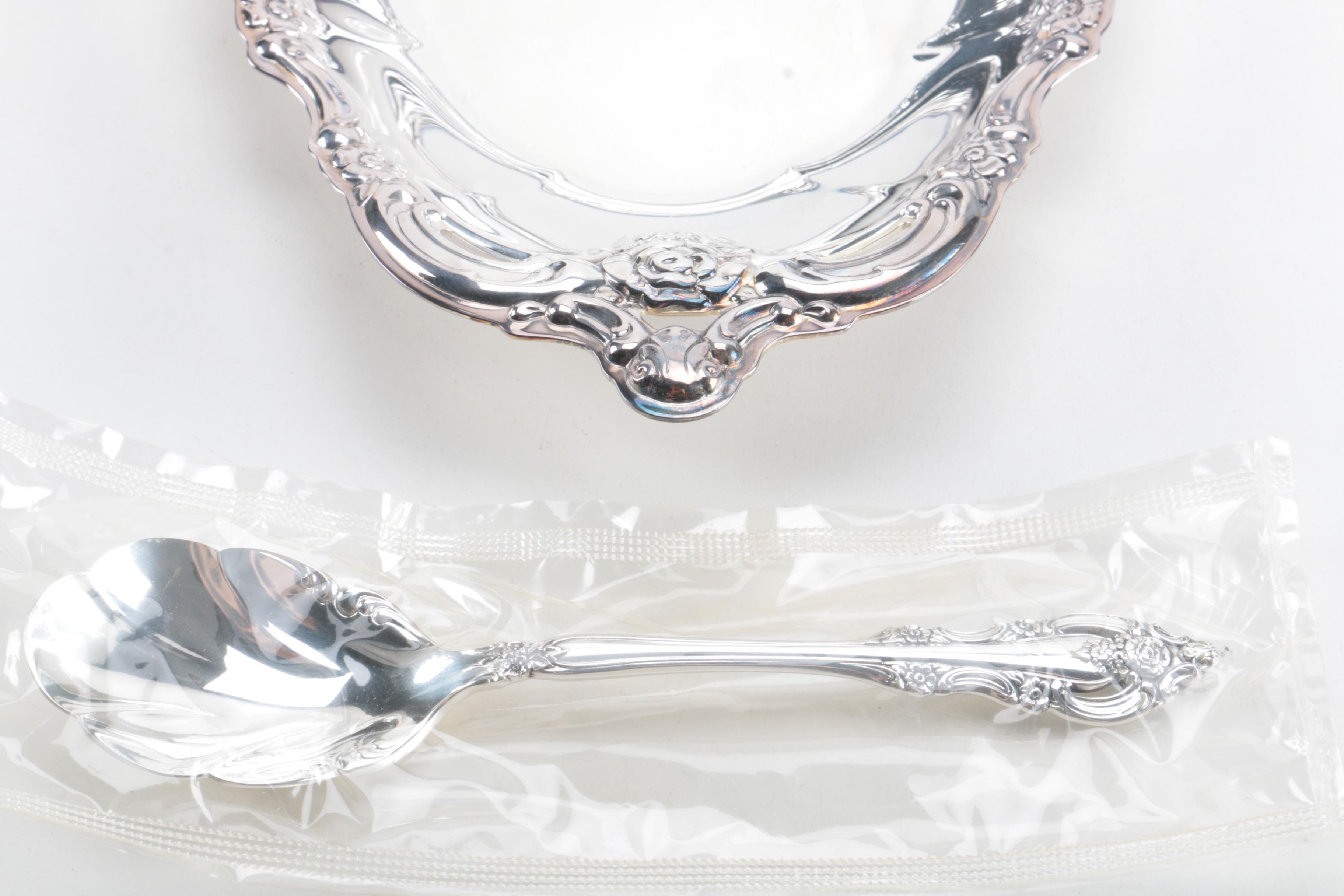 Collection of Knives and Silver Plate Serving Pieces