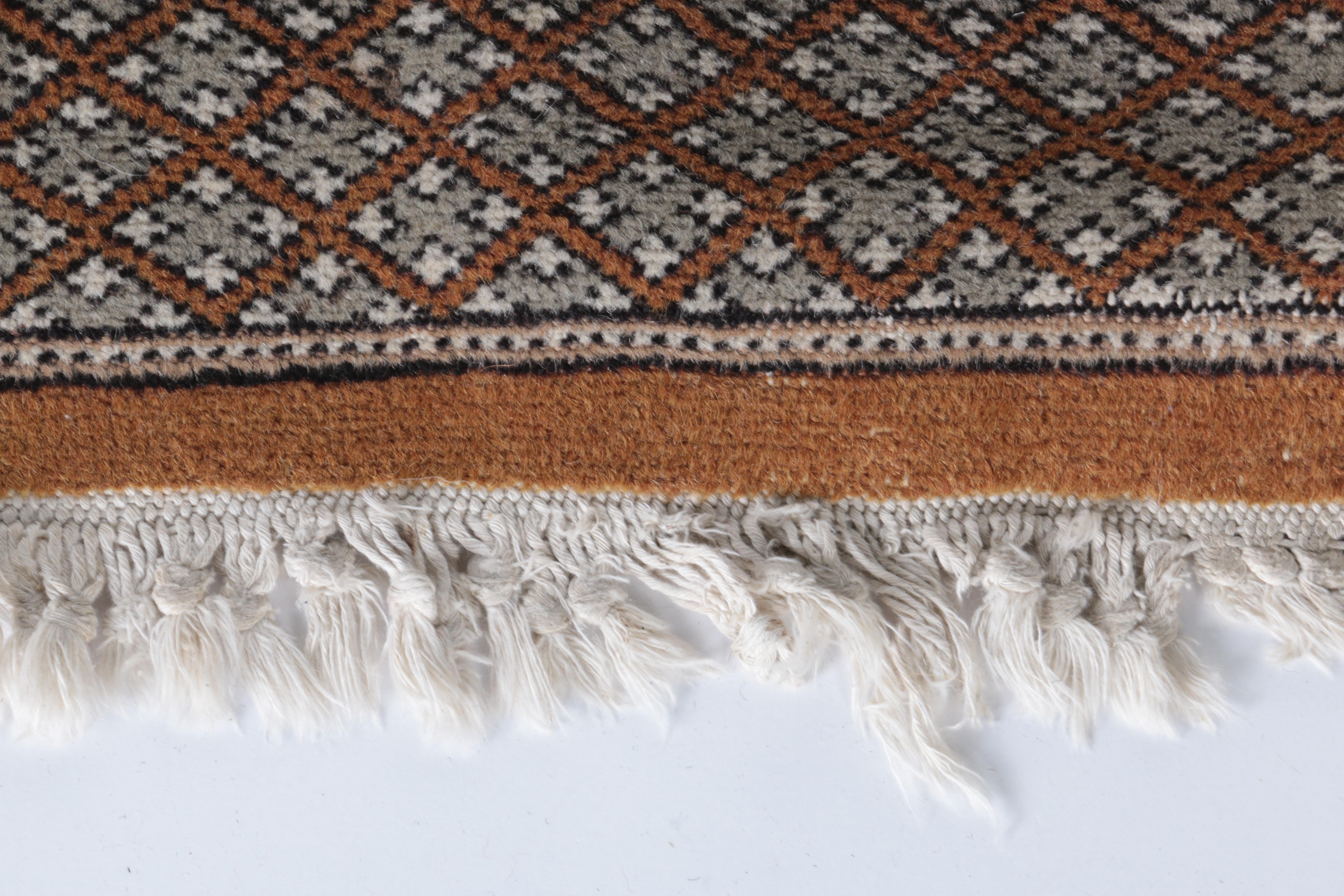 Hand-Knotted Bokhara Area Rug